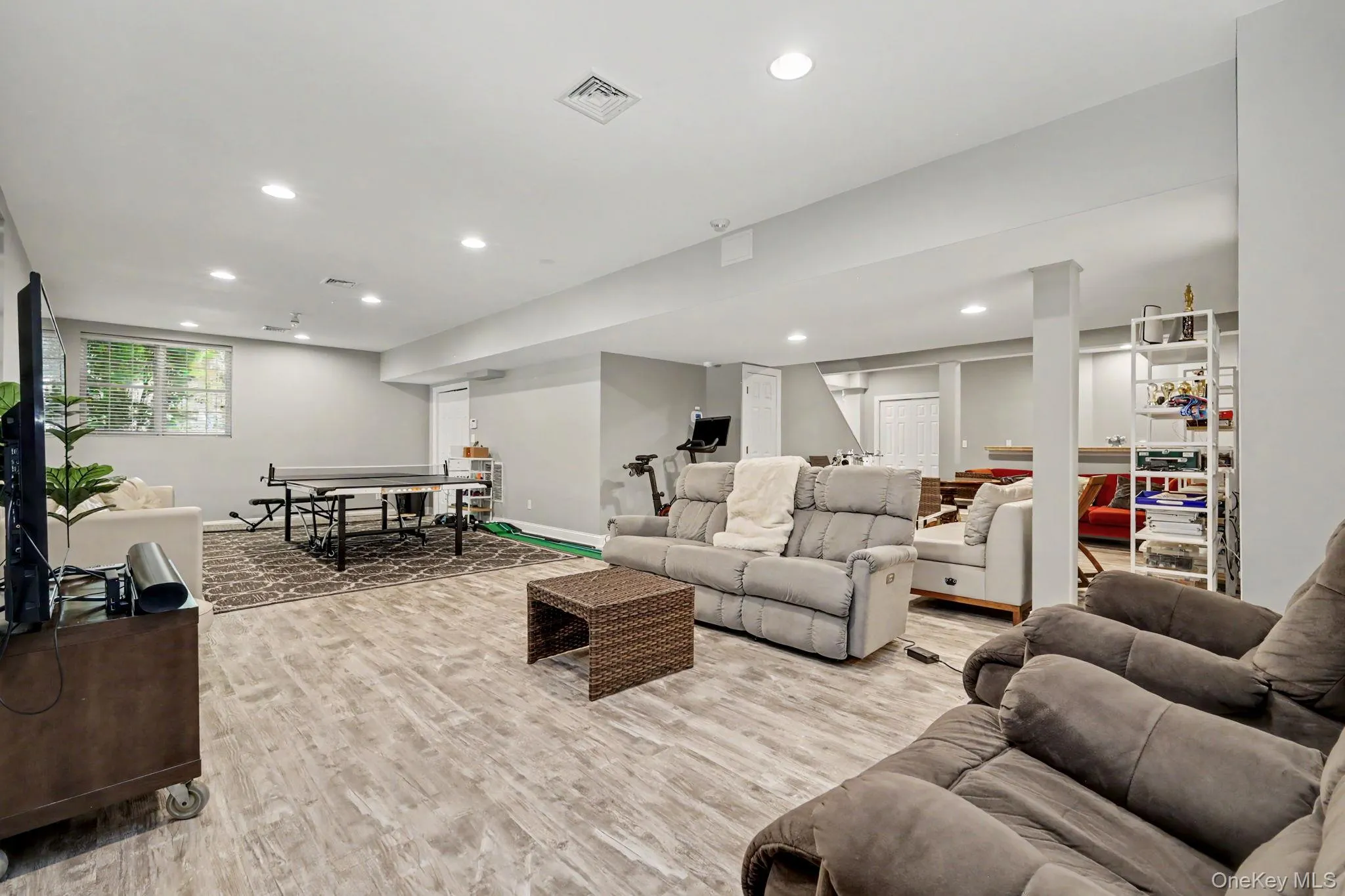 Spacious walkout lower level with recessed lighting Spacious walkout lower level with recessed lighting