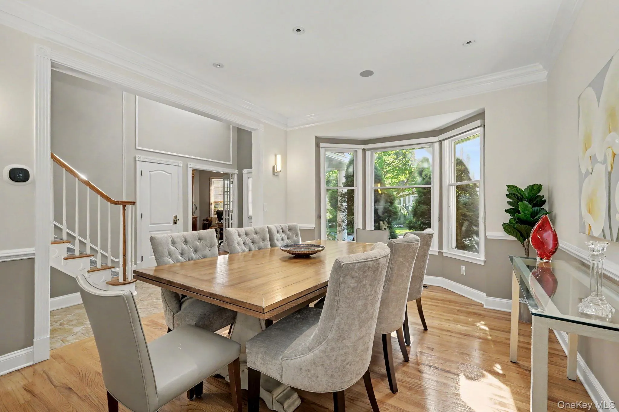 Hardwood flooring throughout with a bay window feature Hardwood flooring throughout with a bay window feature