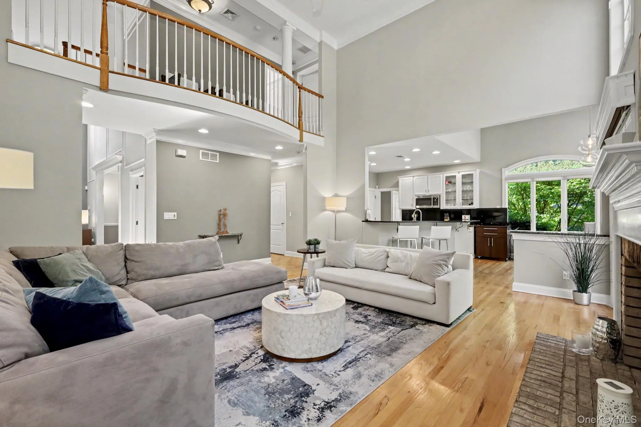 Great room featuring a vaulted ceiling. Great room featuring a vaulted ceiling.