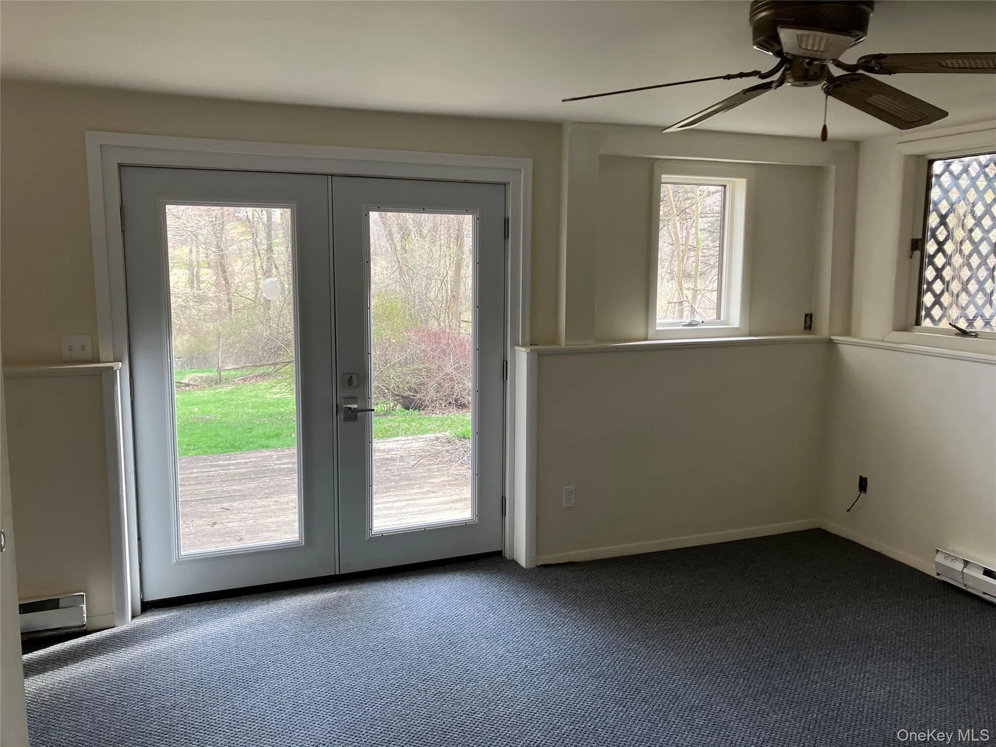 Bedroom (with deck and double doors) Bedroom (with deck and double doors)