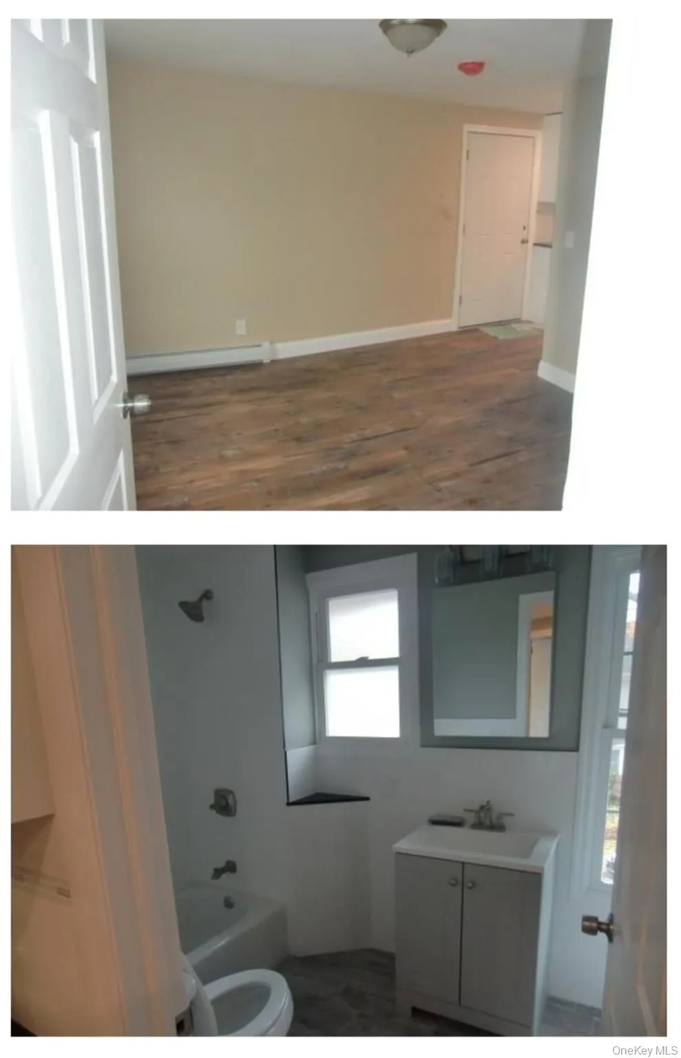Full bathroom featuring bathing tub / shower combination, toilet, vanity, wood finished floors, and baseboards Full bathroom featuring bathing tub / shower combination, toilet, vanity, wood finished floors, and baseboards