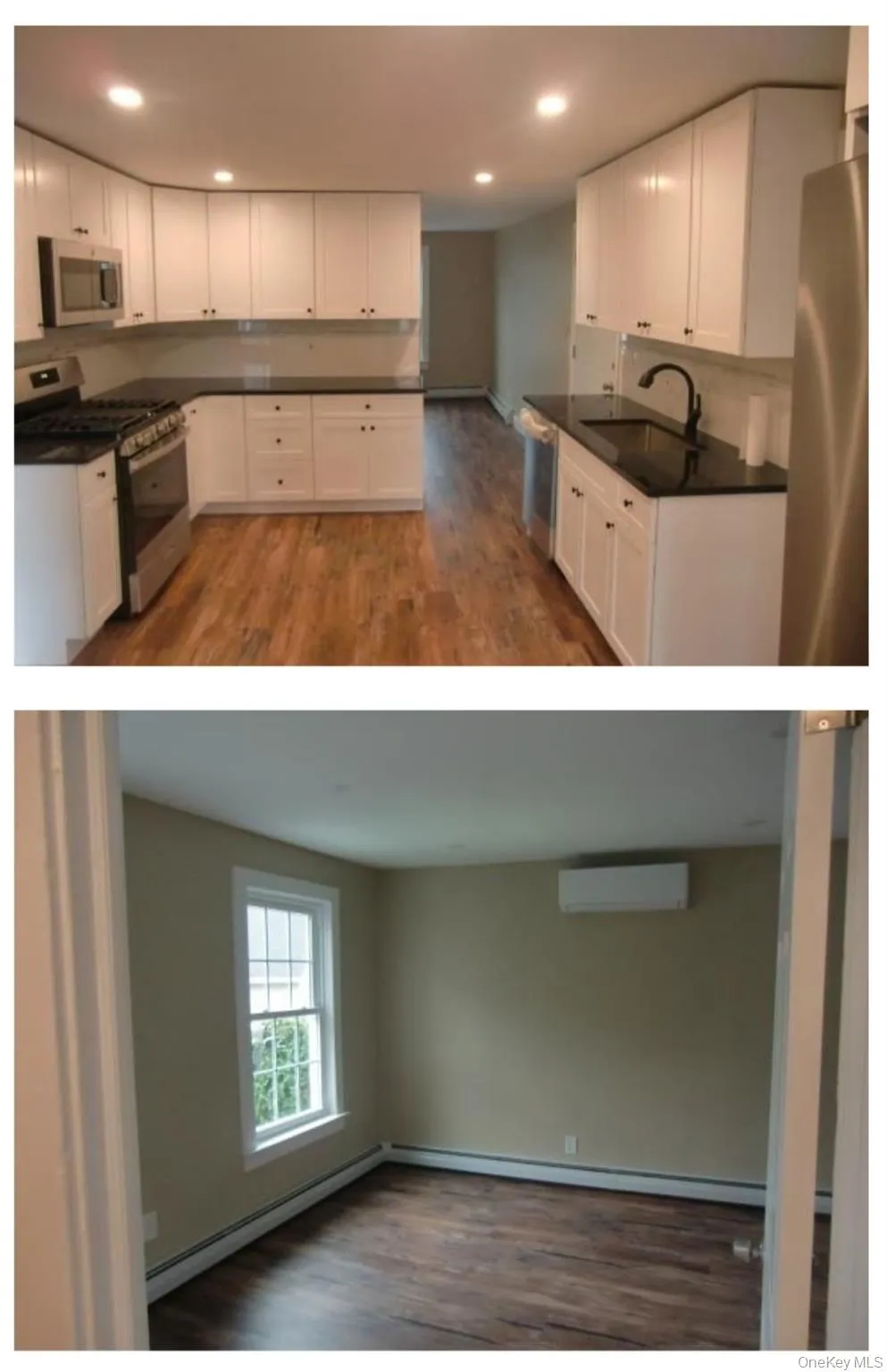 Kitchen featuring dark countertops, white cabinetry, stainless steel appliances, and an AC wall unit Kitchen featuring dark countertops, white cabinetry, stainless steel appliances, and an AC wall unit