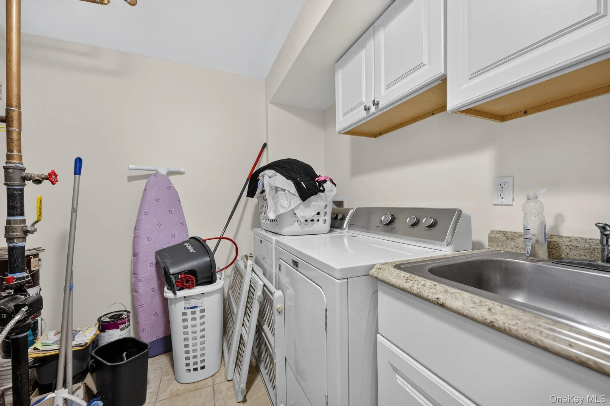 Lower level laundry & utility room Lower level laundry & utility room