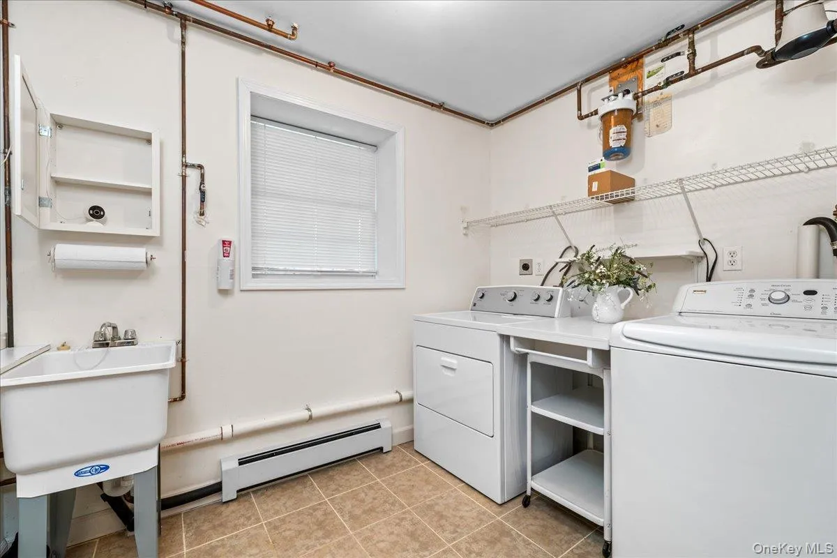The spacious laundry room and utility sink make things easier. The spacious laundry room and utility sink make things easier.