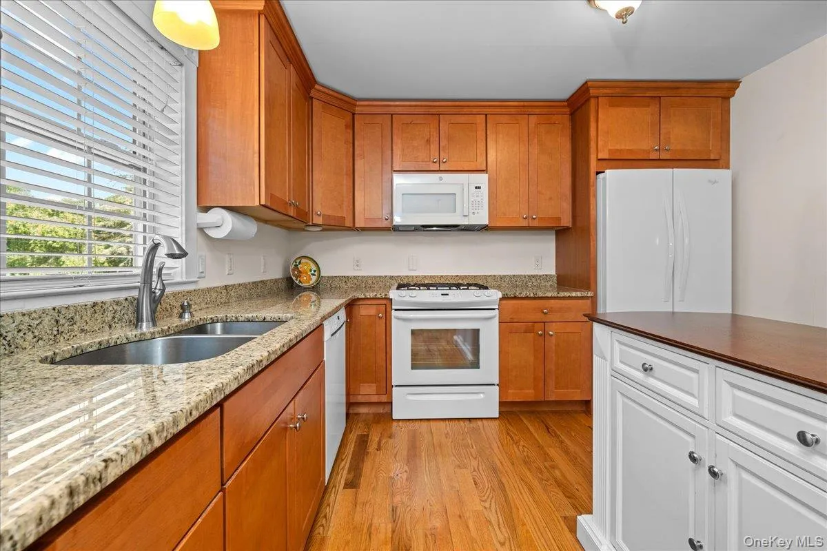 Granite counters and stainless steel sink. Granite counters and stainless steel sink.