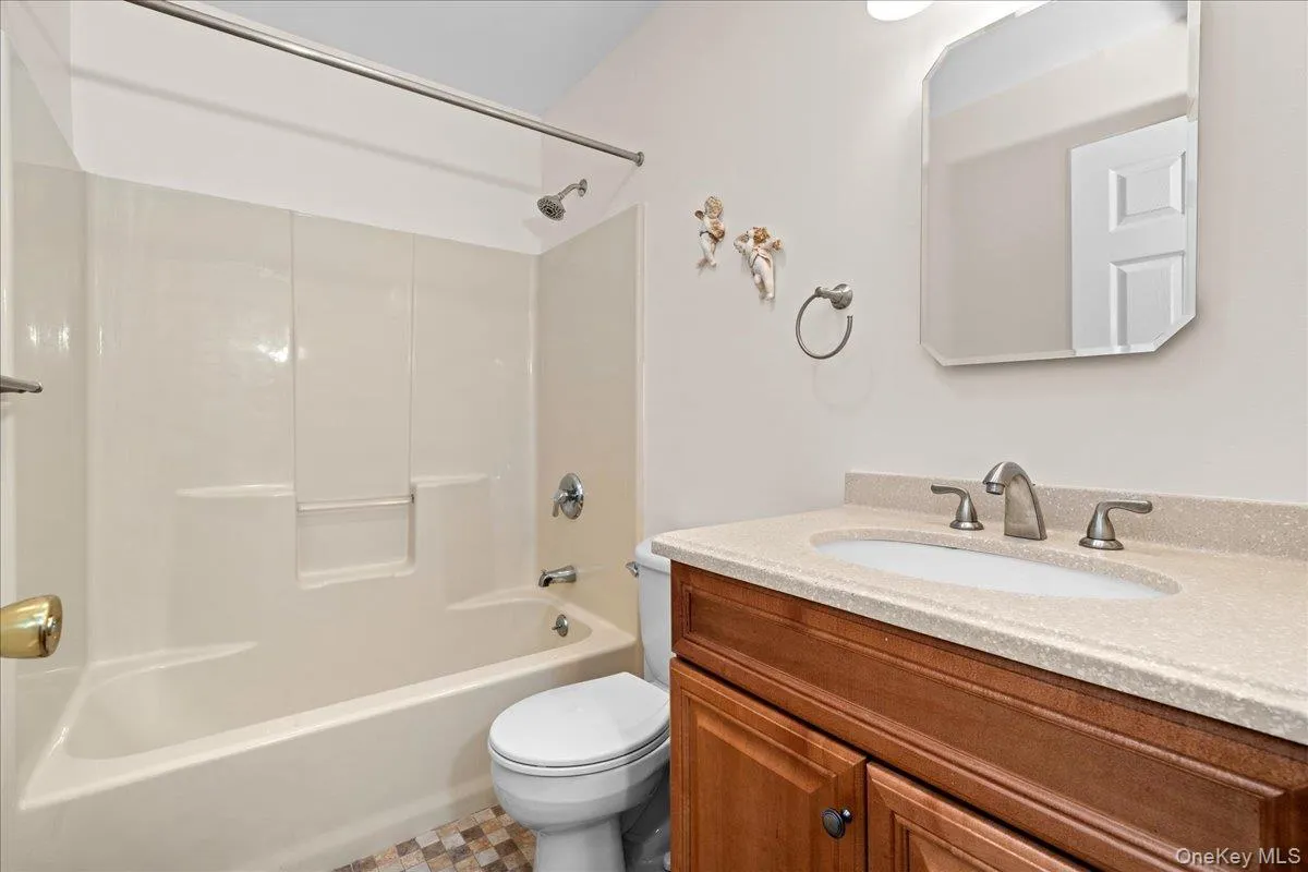The main bathroom on the hallway between the living spaces and the bedrooms. The main bathroom on the hallway between the living spaces and the bedrooms.