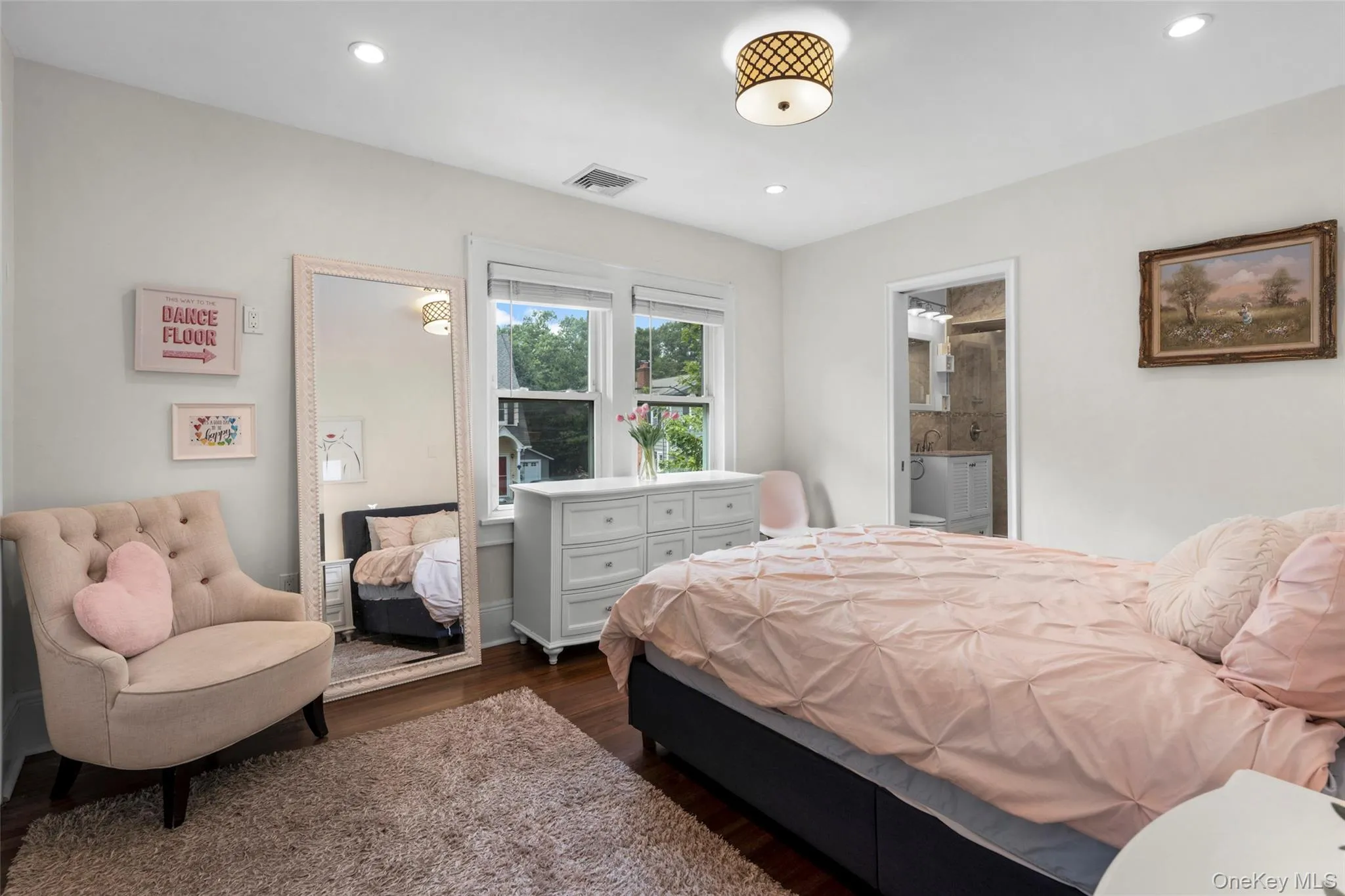 Spacious primary suite with his and hers closets. Spacious primary suite with his and hers closets.