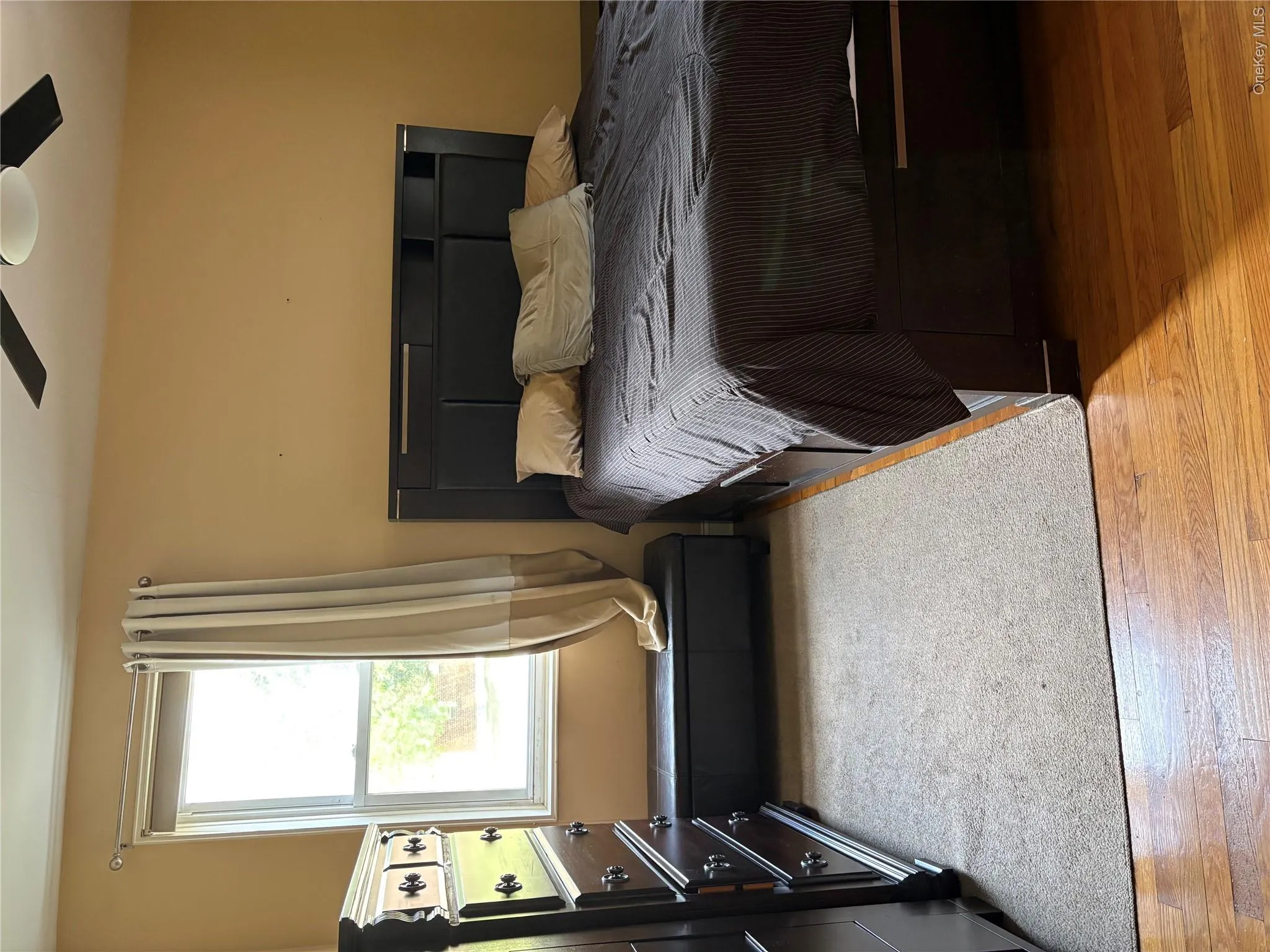 Bedroom features two windows and a closet . Bedroom features two windows and a closet .
