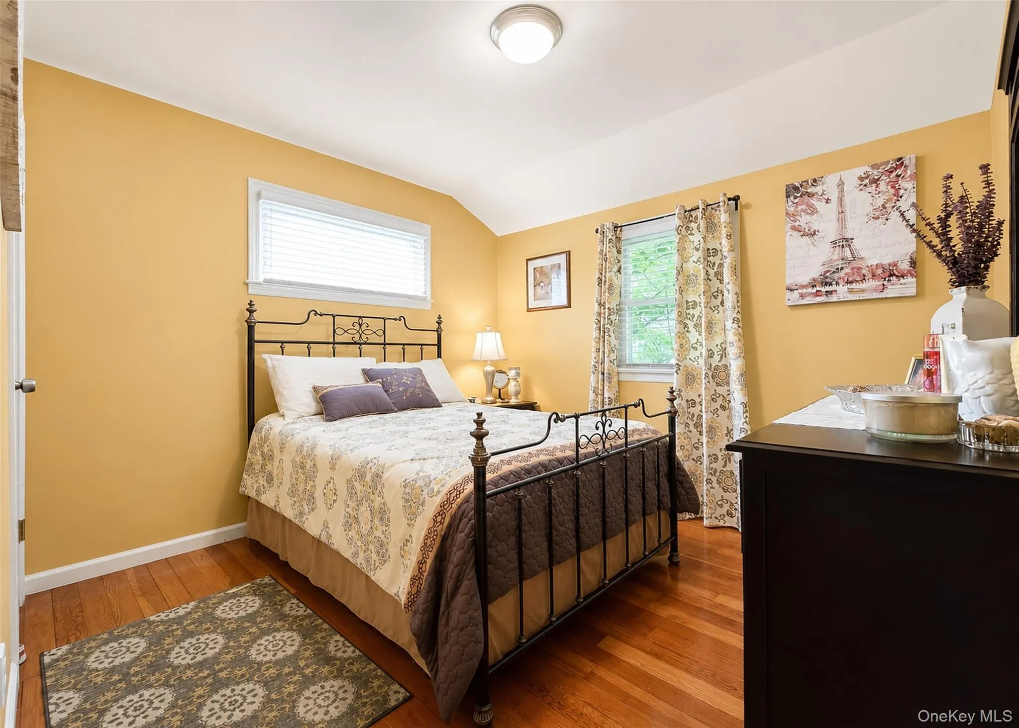 Bedroom With Hardwood Flooring & Ample Closet Space. Bedroom With Hardwood Flooring & Ample Closet Space.