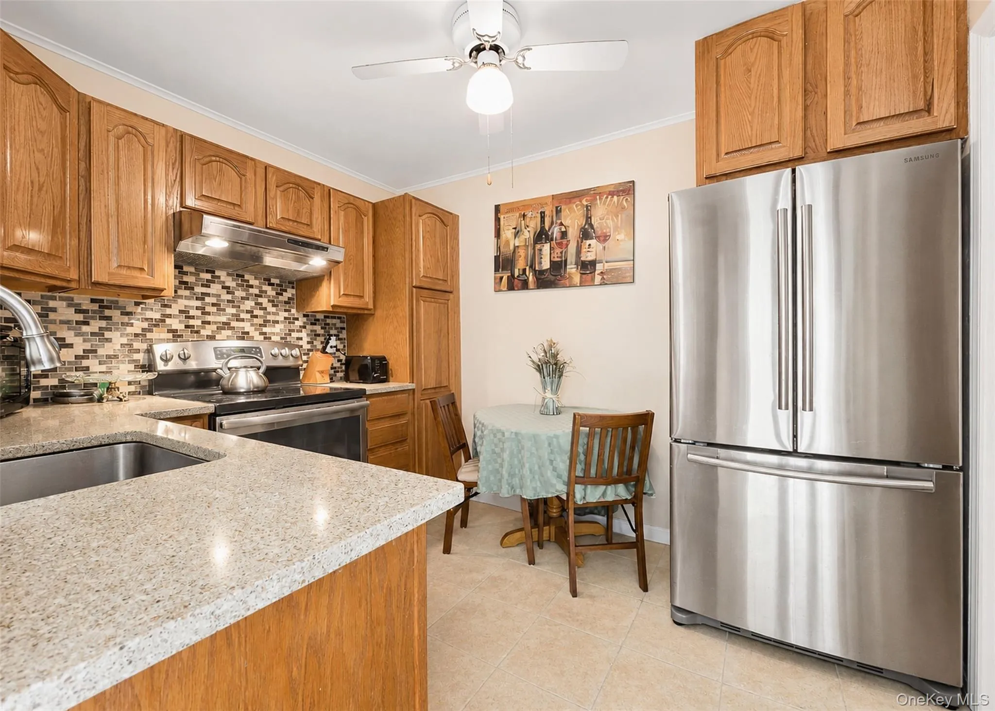 Stainless Appliances, Undermount Sink, & Ceramic Tile Flooring. Stainless Appliances, Undermount Sink, & Ceramic Tile Flooring.