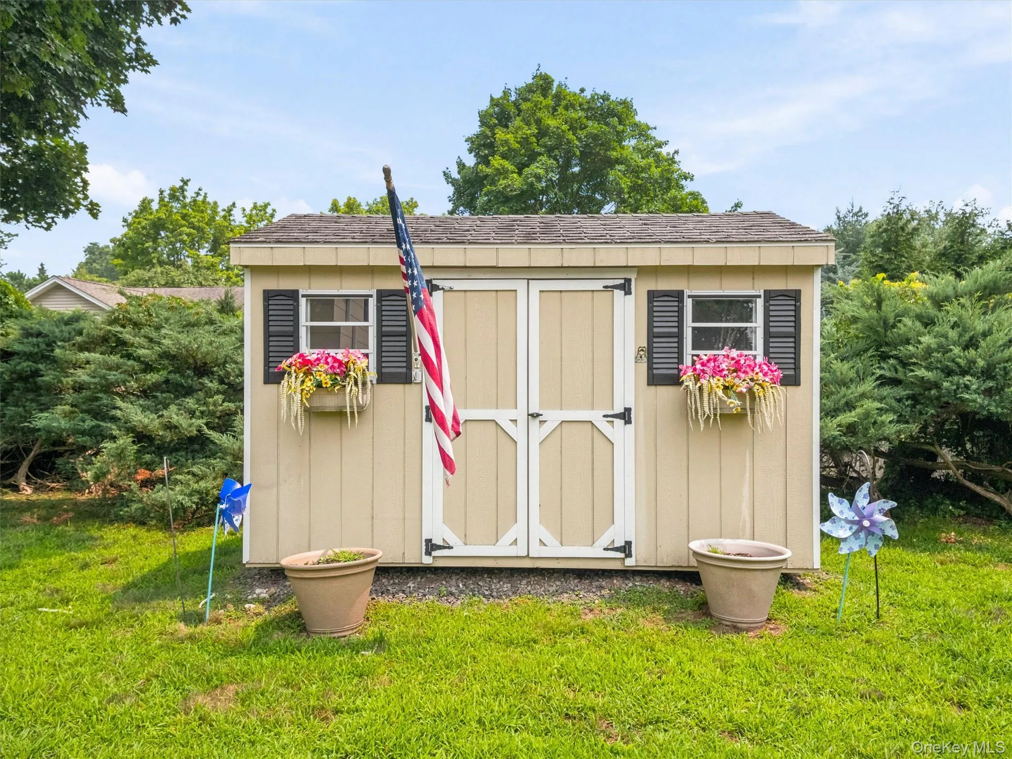 1 of 2 Utility sheds hand made not a kit. Featuring double doors, two windows with shutters. Great for all your outdoor equipment. 1 of 2 Utility sheds hand made not a kit. Featuring double doors, two windows with shutters. Great for all your outdoor equipment.