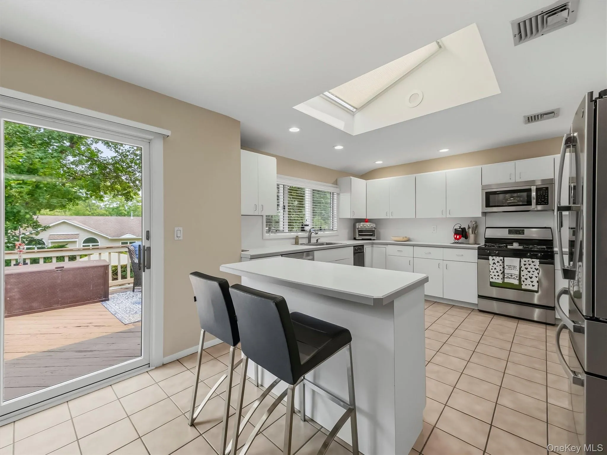 The Dinning room has double door sliders that lead out to you multi tier deck. The Dinning room has double door sliders that lead out to you multi tier deck.