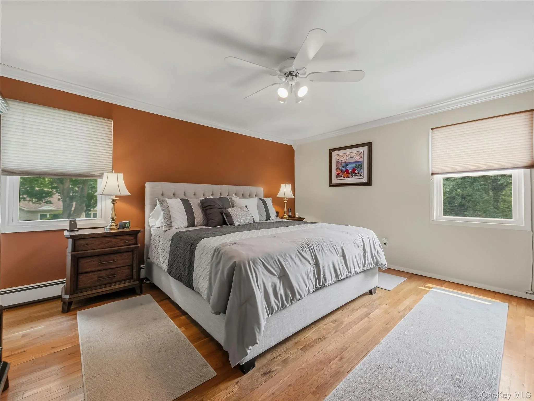 A warm and inviting primary bedroom complete with a private en-suite bathroom. A warm and inviting primary bedroom complete with a private en-suite bathroom.
