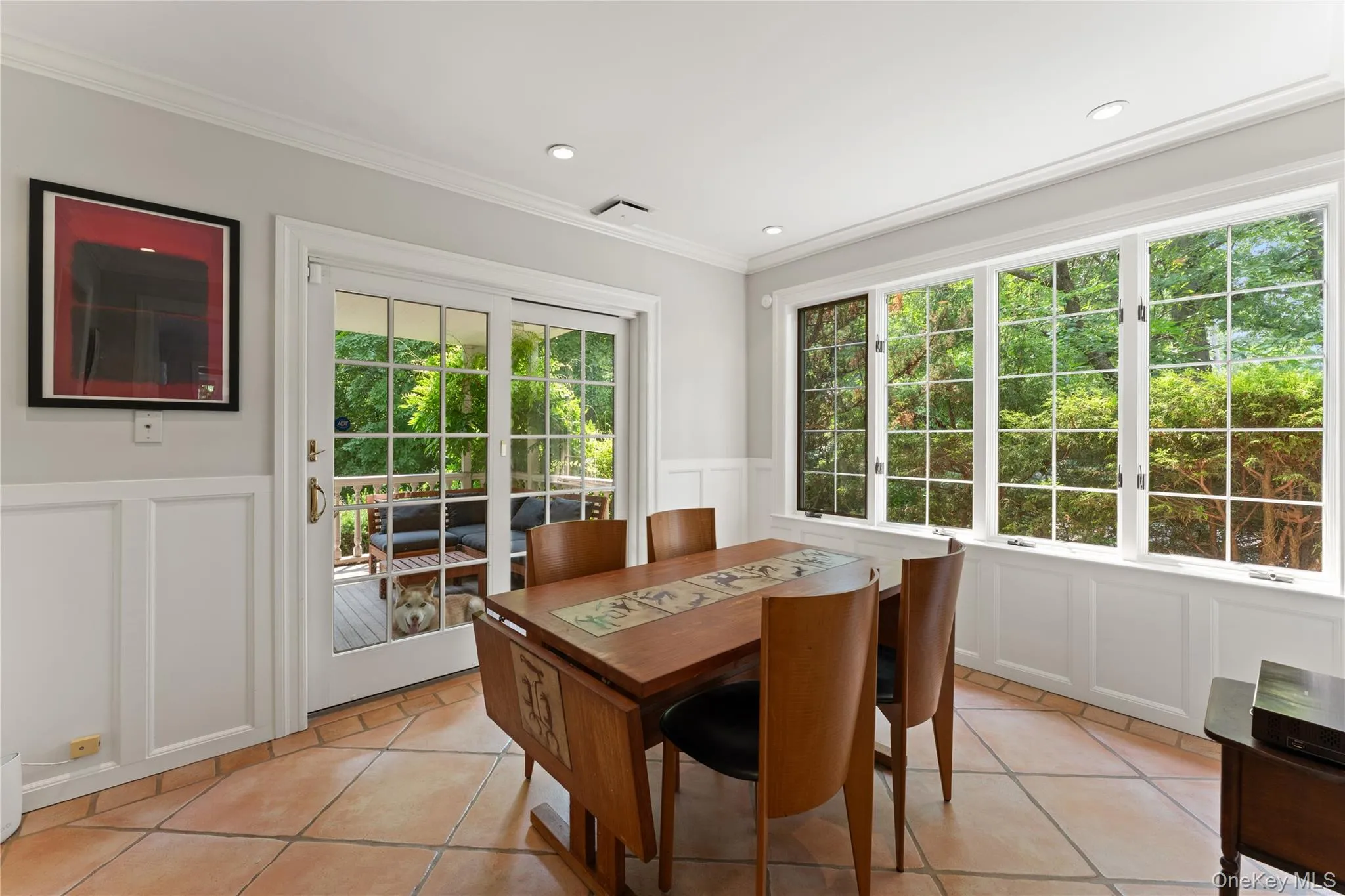 Breakfast Room with access to the covered porch. Breakfast Room with access to the covered porch.