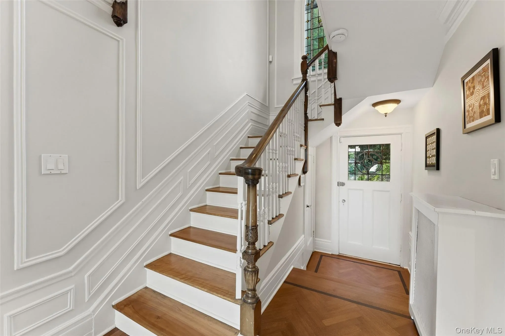 Main Staircase providing access to the second level and also access to the gardens. Main Staircase providing access to the second level and also access to the gardens.