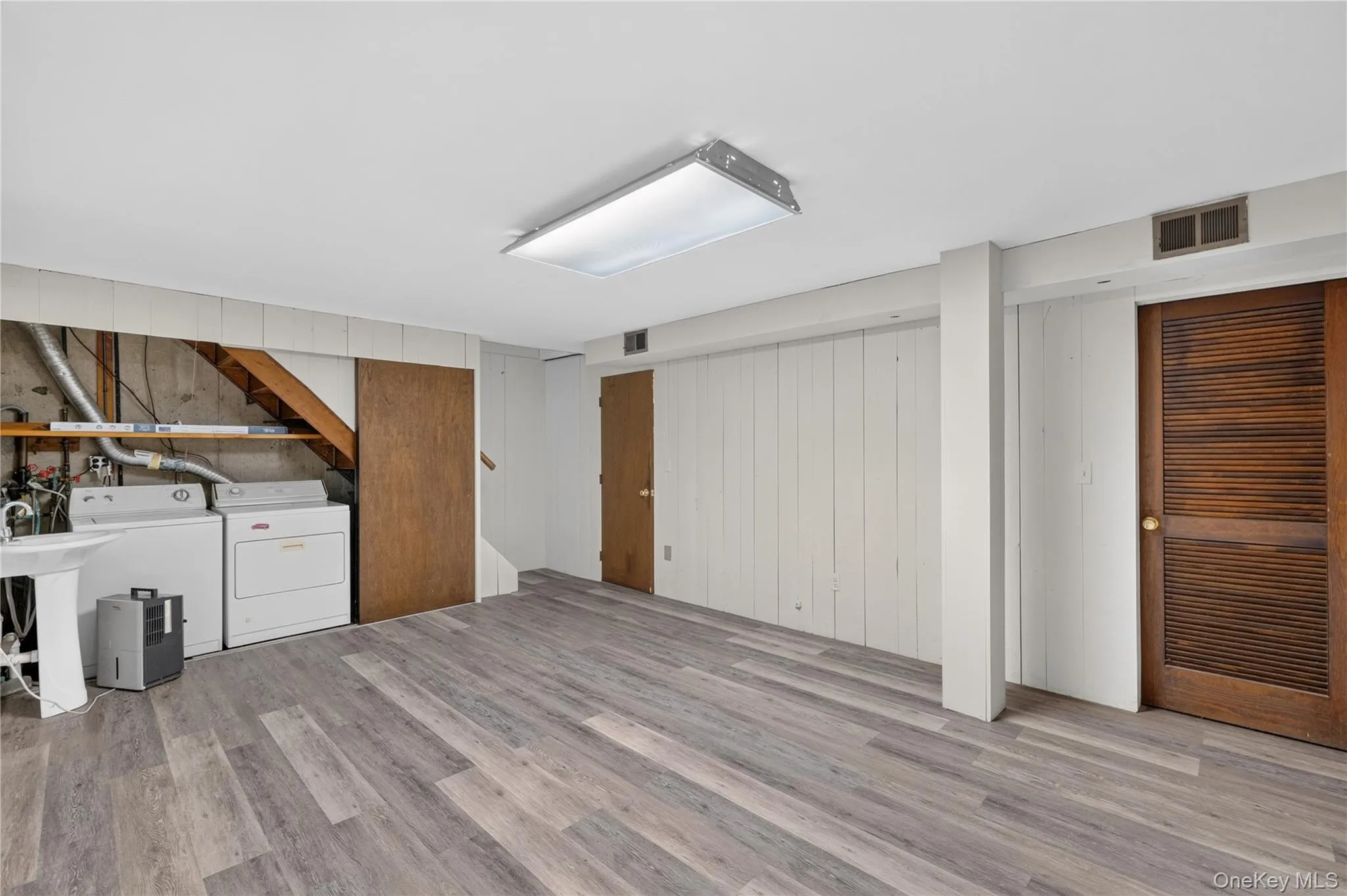 Lower level storage and laundry room Lower level storage and laundry room