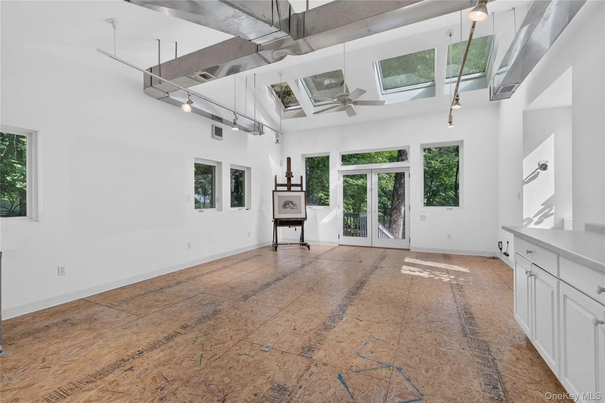 Sunny 400 sq foot art studio with skylights and separate entrance. Great for professional office, yoga studio or rec room Sunny 400 sq foot art studio with skylights and separate entrance. Great for professional office, yoga studio or rec room