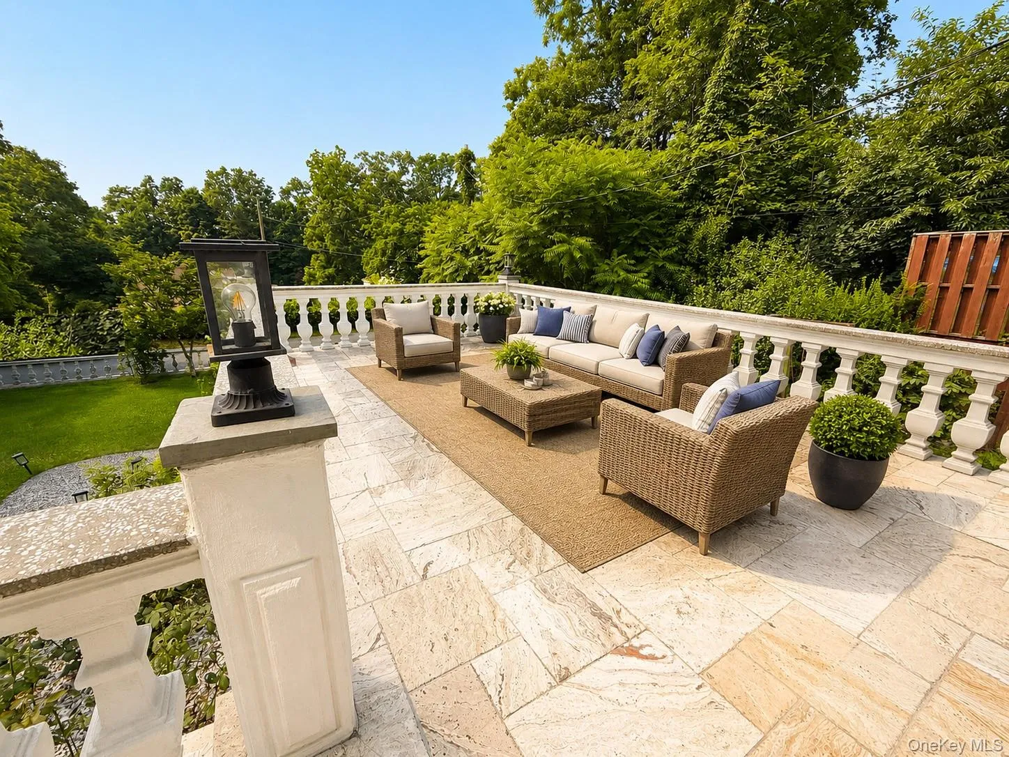 Virtually staged to envision outdoor entertaining on the terrace off the family room Virtually staged to envision outdoor entertaining on the terrace off the family room