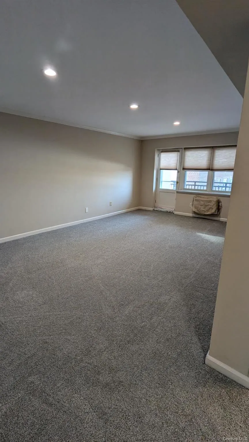 Living room from entry way looking out towards balcony Living room from entry way looking out towards balcony