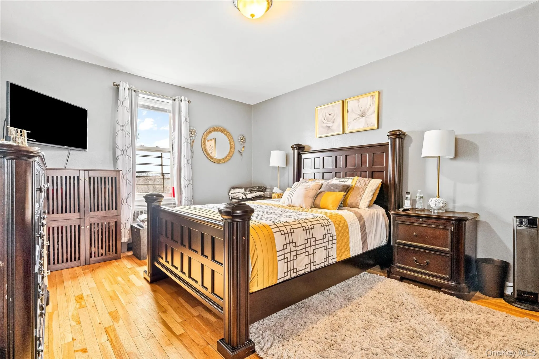 Bedroom with light wood finished floors Bedroom with light wood finished floors