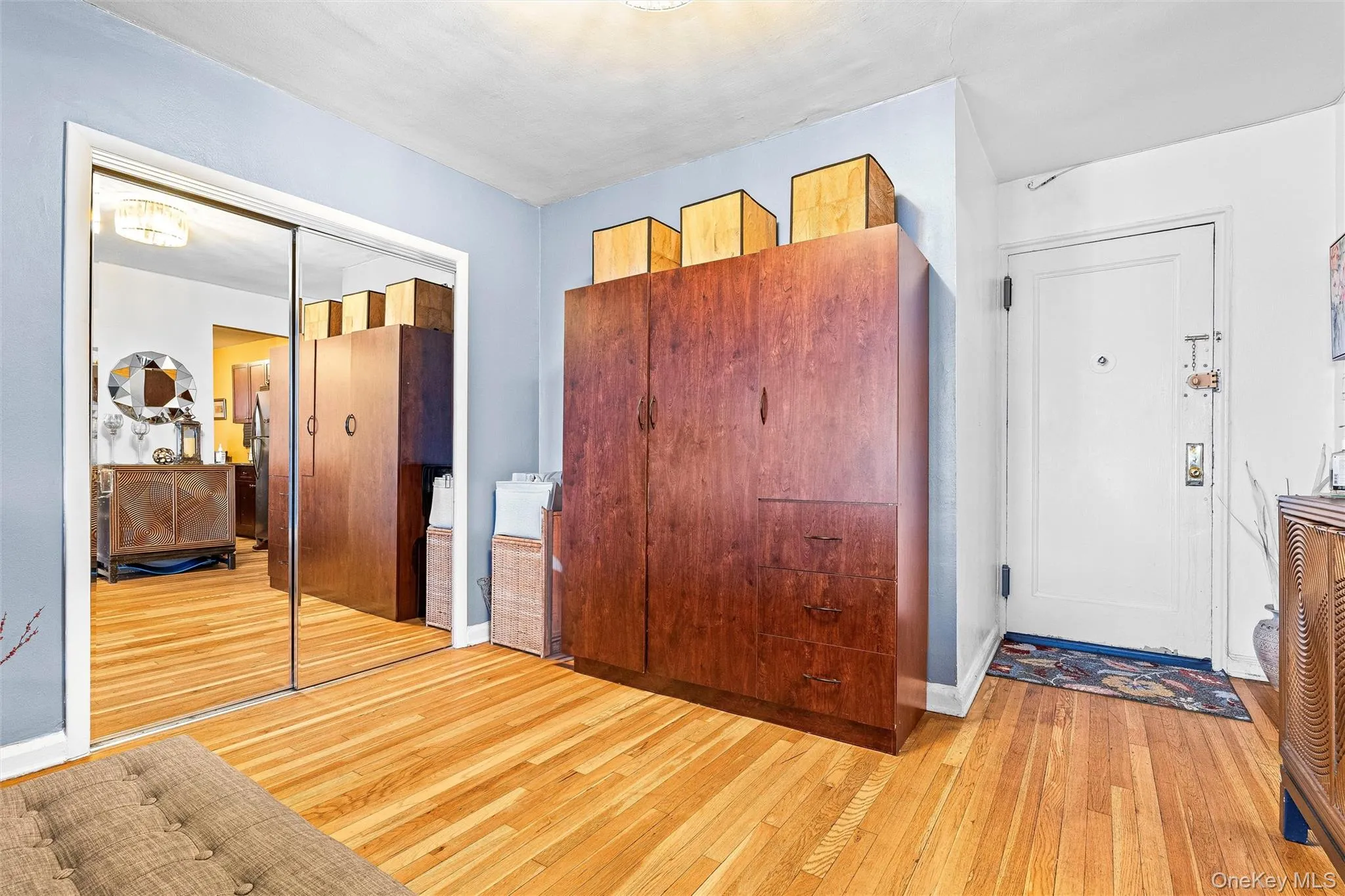 Foyer featuring light wood-style floors and baseboards Foyer featuring light wood-style floors and baseboards