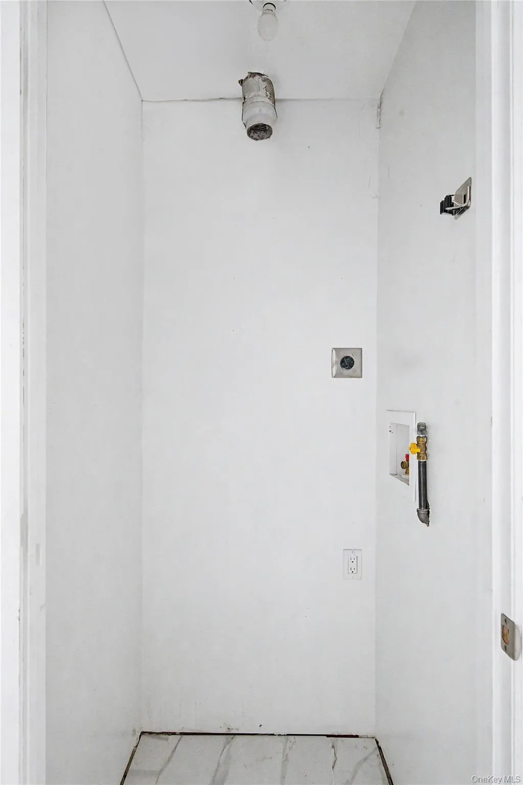 Clean laundry area with dedicated washer and dryer hookups. Clean laundry area with dedicated washer and dryer hookups.