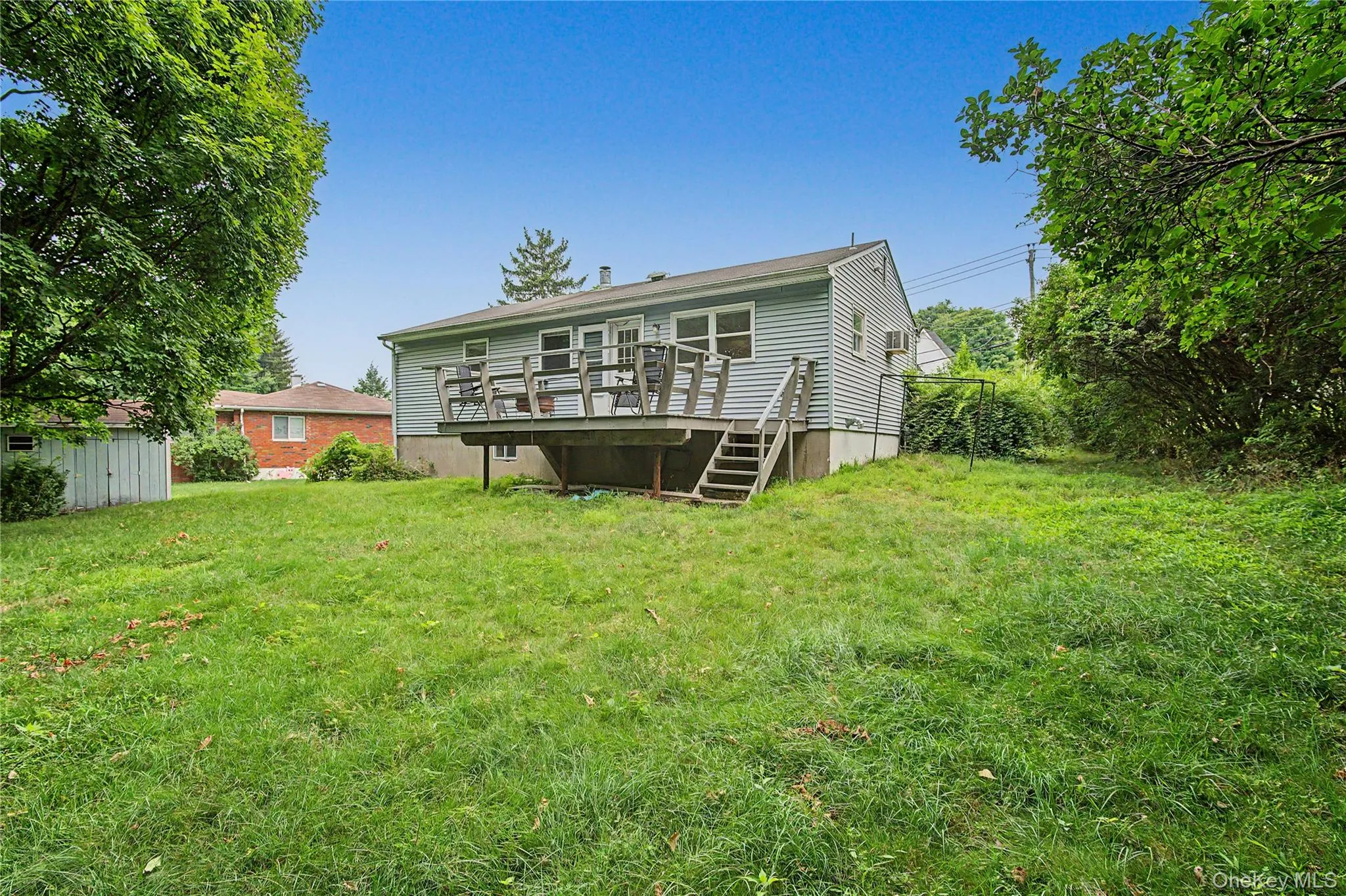 Spacious rear yard with beautiful lawn and private surroundings. Spacious rear yard with beautiful lawn and private surroundings.