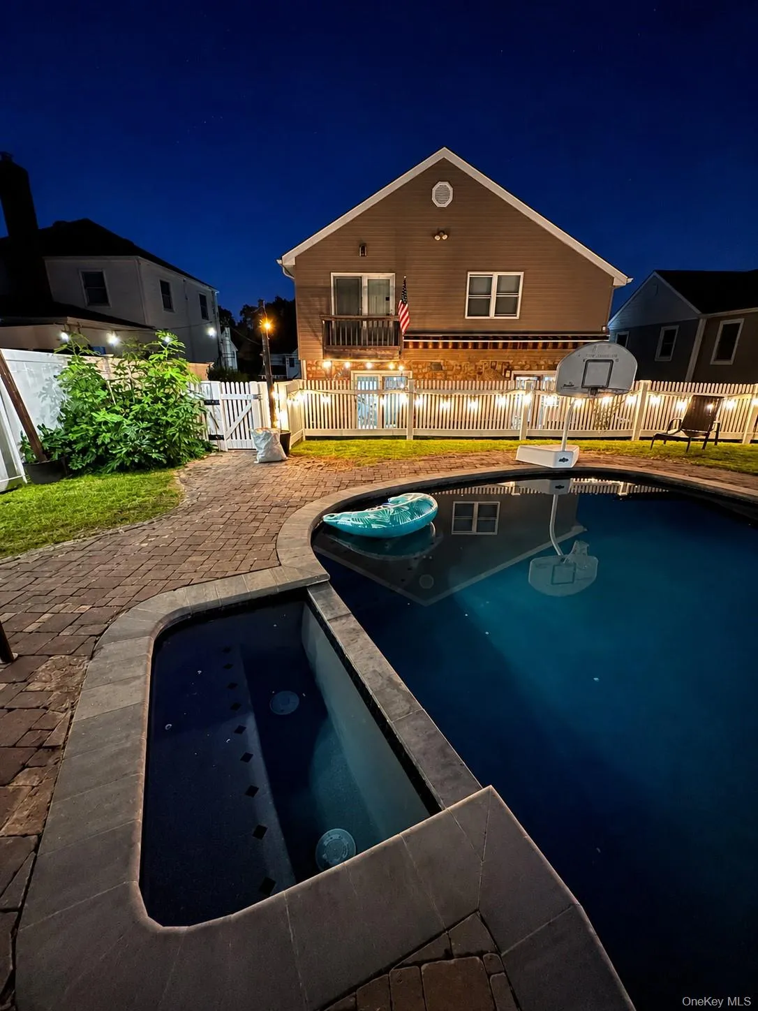 An exceptional outdoor resort inspired pool and spa, paver hardscaping, ambient evening lighting, and multiple areas to relax and unwind. An exceptional outdoor resort inspired pool and spa, paver hardscaping, ambient evening lighting, and multiple areas to relax and unwind.