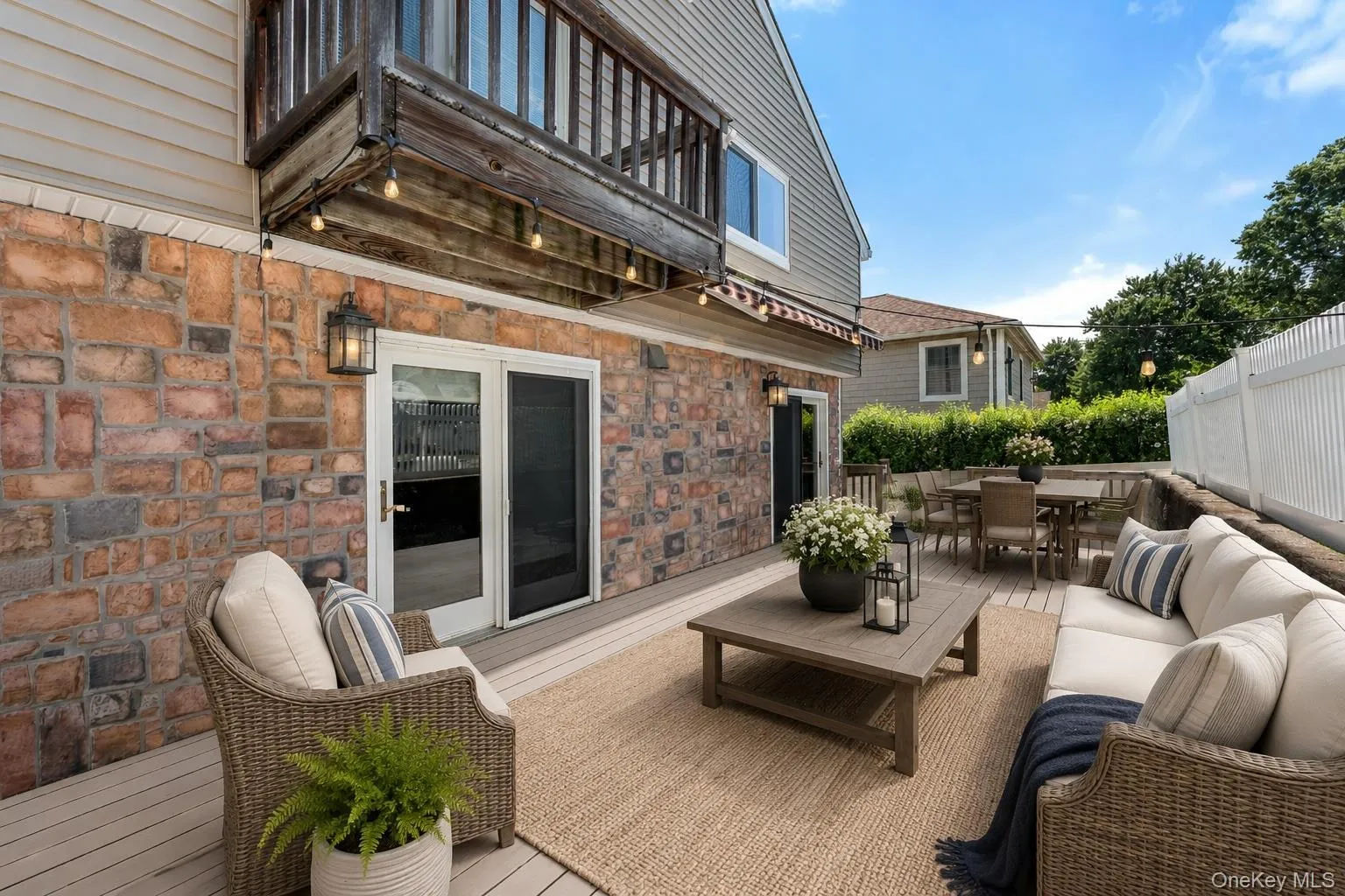 Virtually staged deck with access to the family room and the dine-in kitchen. Virtually staged deck with access to the family room and the dine-in kitchen.