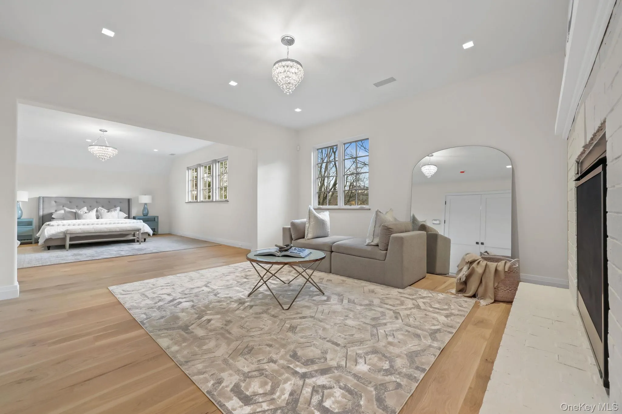 Primary bedroom suite with sitting room/fireplace, dual baths and double walk in closets Primary bedroom suite with sitting room/fireplace, dual baths and double walk in closets
