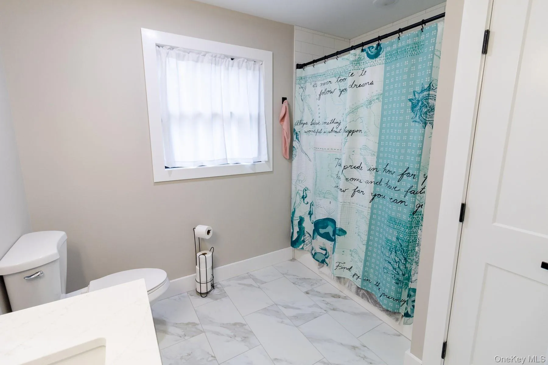 This additional full bathroom combines a tub/shower configuration, natural light, and timeless finishes that make it easy to personalize the space. This additional full bathroom combines a tub/shower configuration, natural light, and timeless finishes that make it easy to personalize the space.