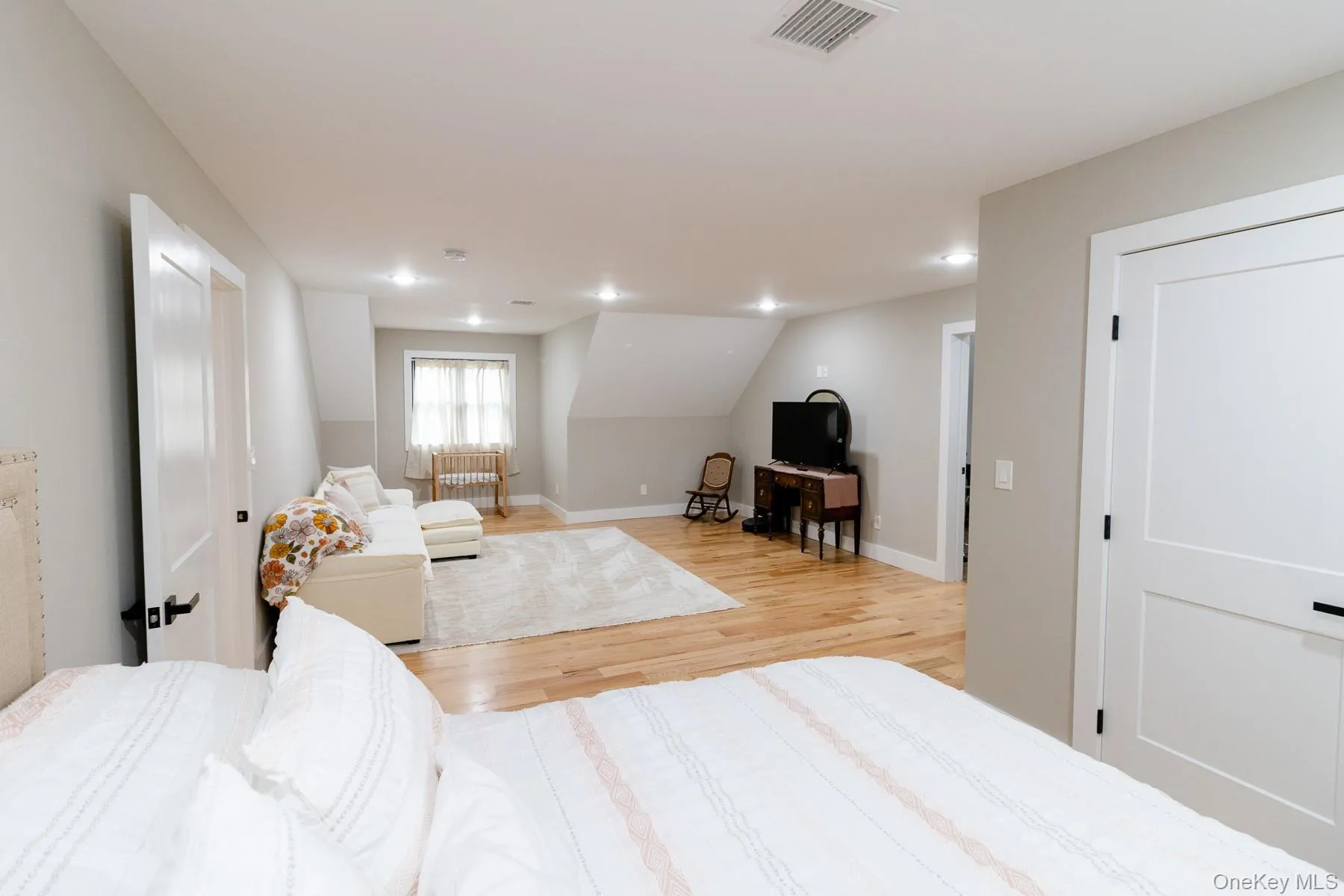 A thoughtfully proportioned bedroom/bonus room creates a natural separation between the sleeping quarters and versatile lounge space, offering comfort without compromising openness. A thoughtfully proportioned bedroom/bonus room creates a natural separation between the sleeping quarters and versatile lounge space, offering comfort without compromising openness.