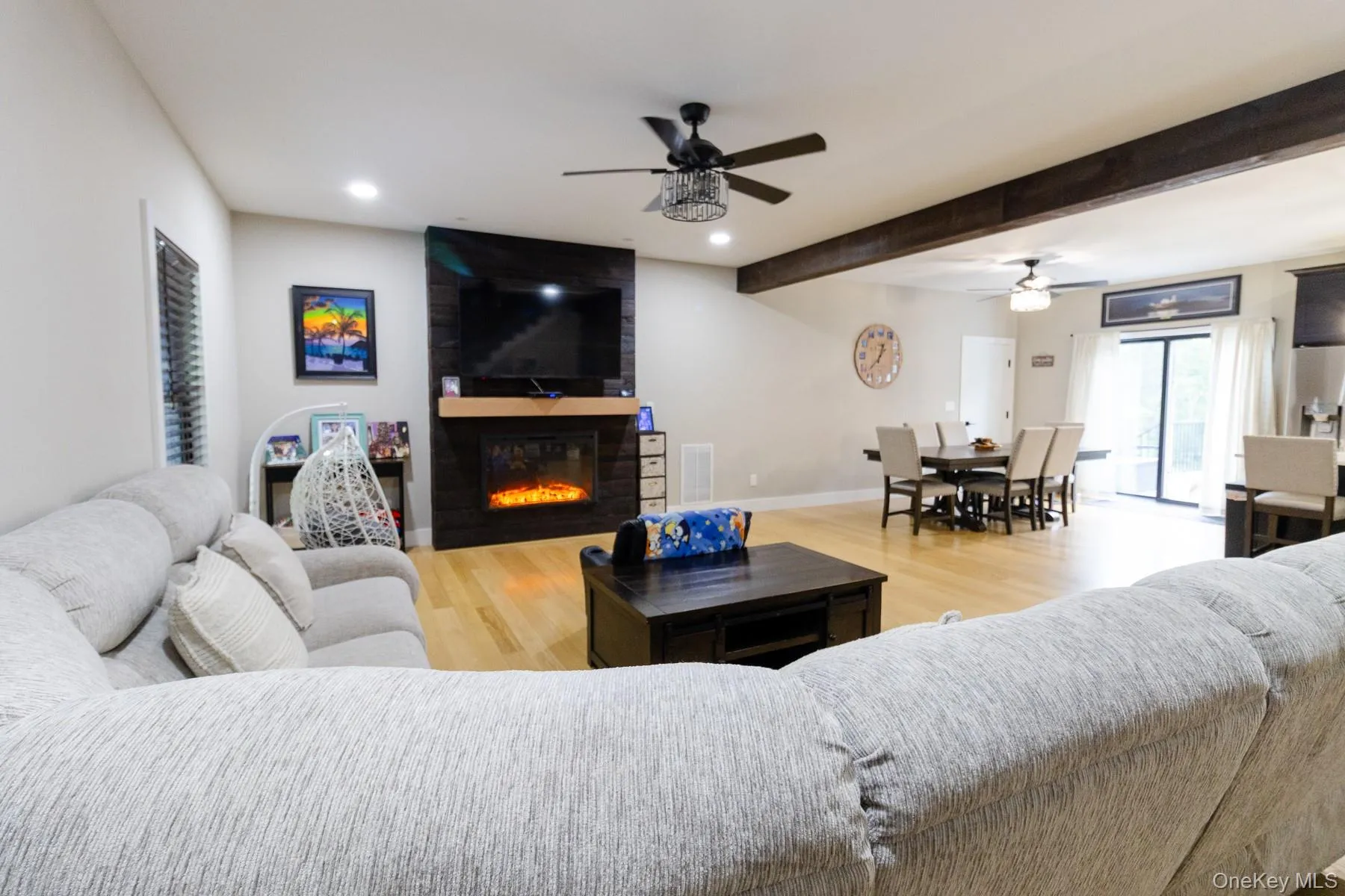 Centered around a contemporary fireplace, the great room offers a warm, welcoming setting that naturally draws family and guests together. Centered around a contemporary fireplace, the great room offers a warm, welcoming setting that naturally draws family and guests together.