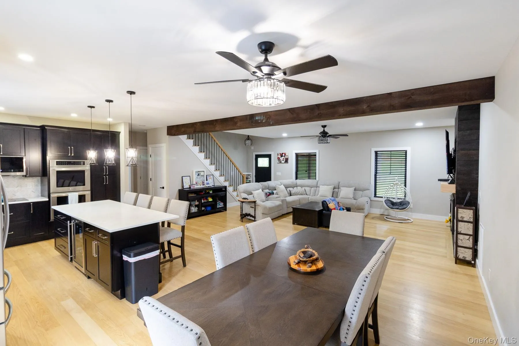 The open concept design creates a seamless flow between the kitchen, dining area, and great room, making every day living and entertaining feel effortlessly connected. The open concept design creates a seamless flow between the kitchen, dining area, and great room, making every day living and entertaining feel effortlessly connected.
