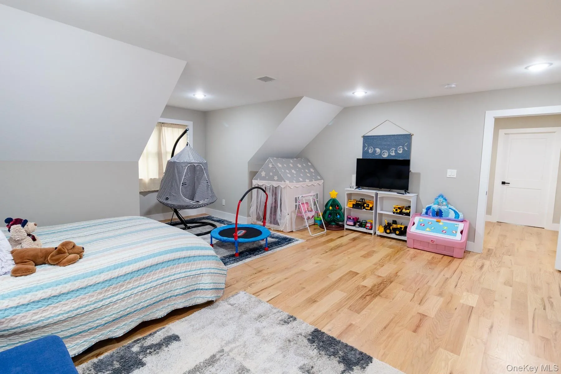 The thoughtfully arranged layout of this spacious bedroom creates distinct zones for cultivation of rest, recreation and every day living while preserving an open, airy feel. The thoughtfully arranged layout of this spacious bedroom creates distinct zones for cultivation of rest, recreation and every day living while preserving an open, airy feel.