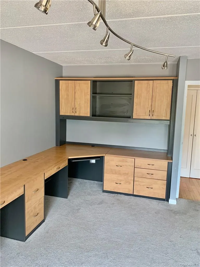 View of second bedroom built-in desk. View of second bedroom built-in desk.