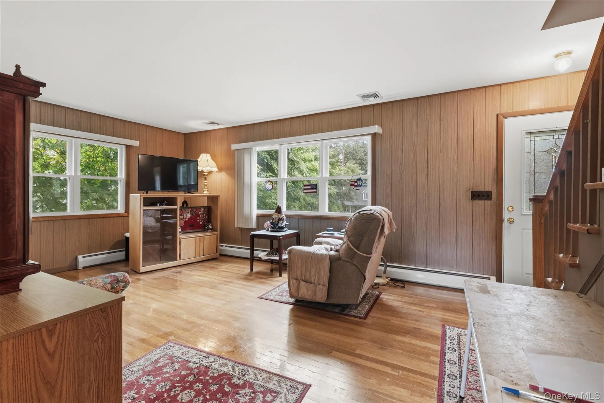 Charming Living Room with Picture Window from Kitchen Charming Living Room with Picture Window from Kitchen