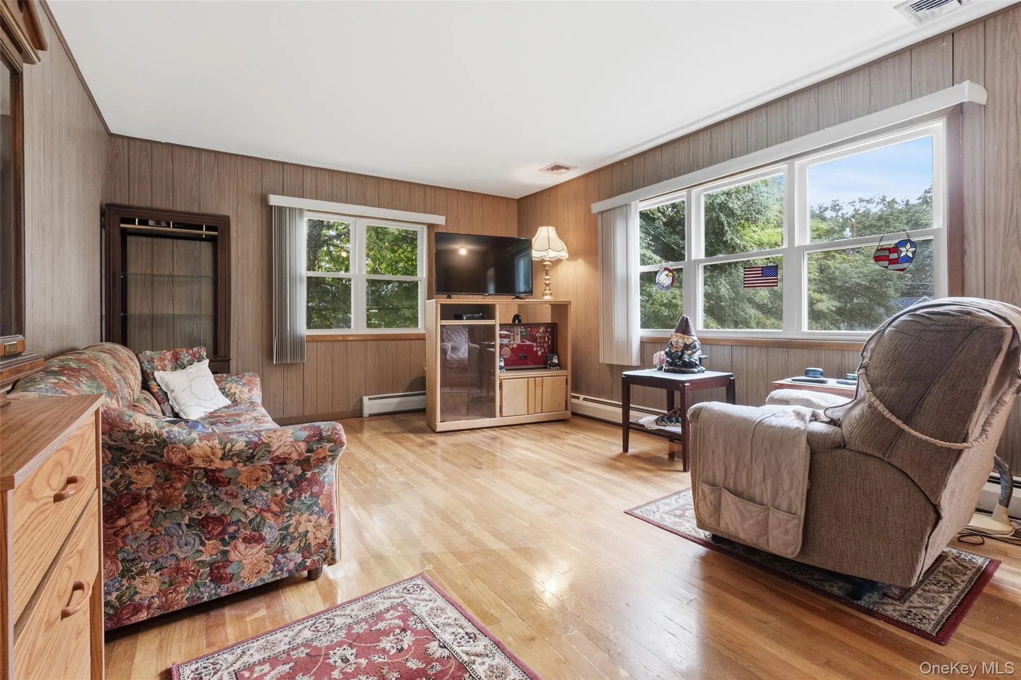 Charming Living Room with Picture Window Charming Living Room with Picture Window