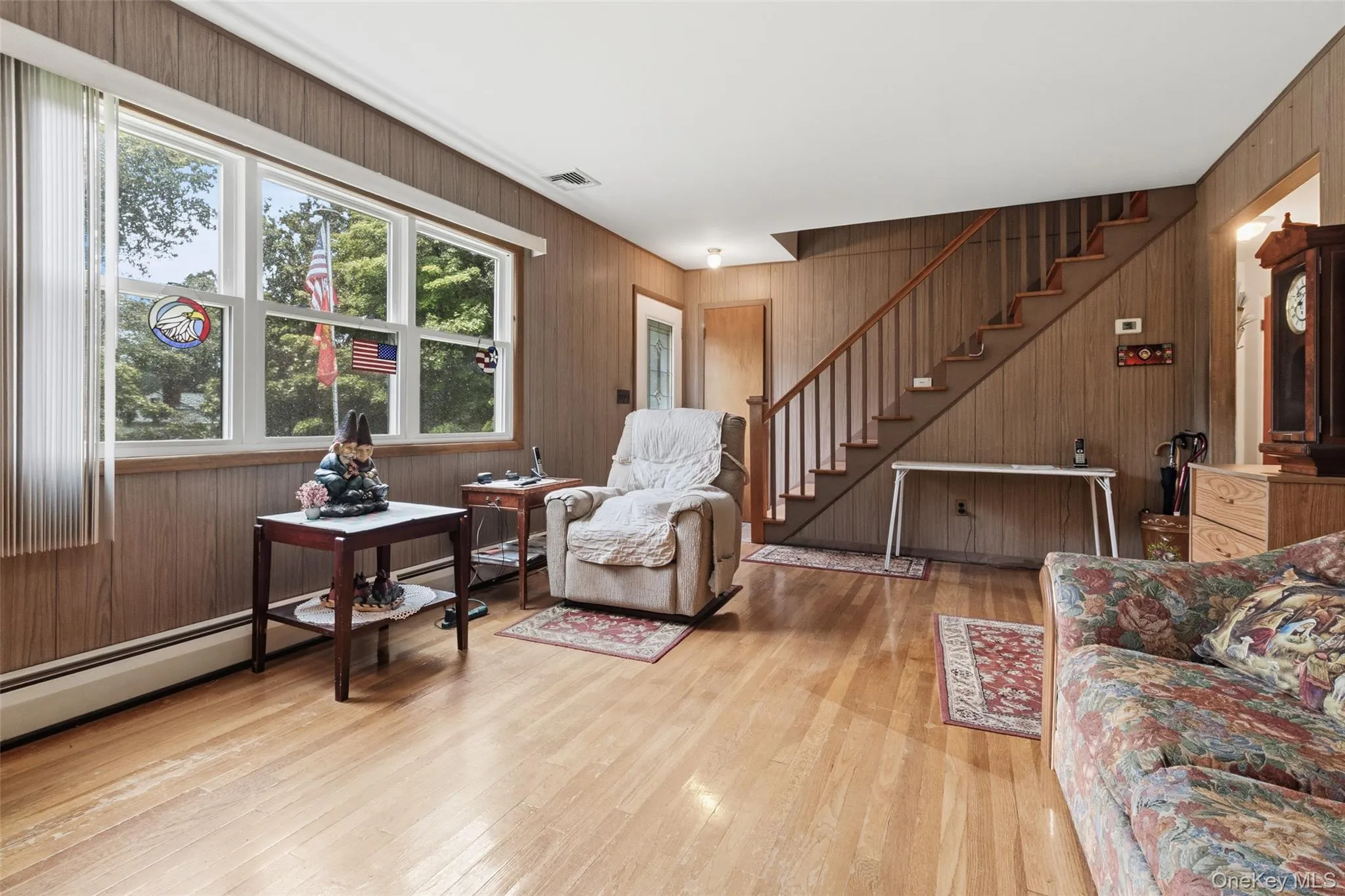 Charming Living Room with Picture Window including Front Door Charming Living Room with Picture Window including Front Door