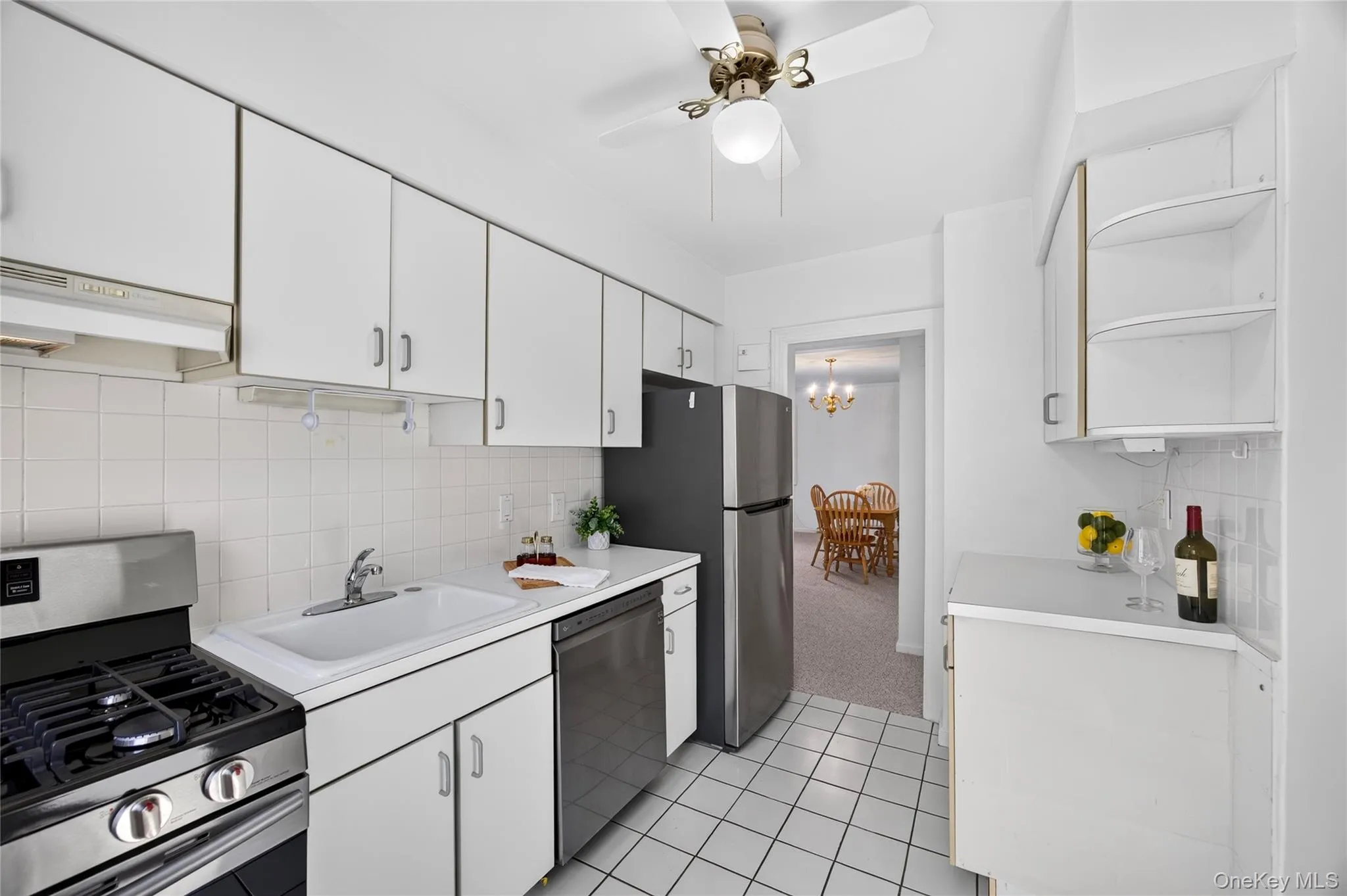 Newly painted kitchen with stainless steel appliances Newly painted kitchen with stainless steel appliances