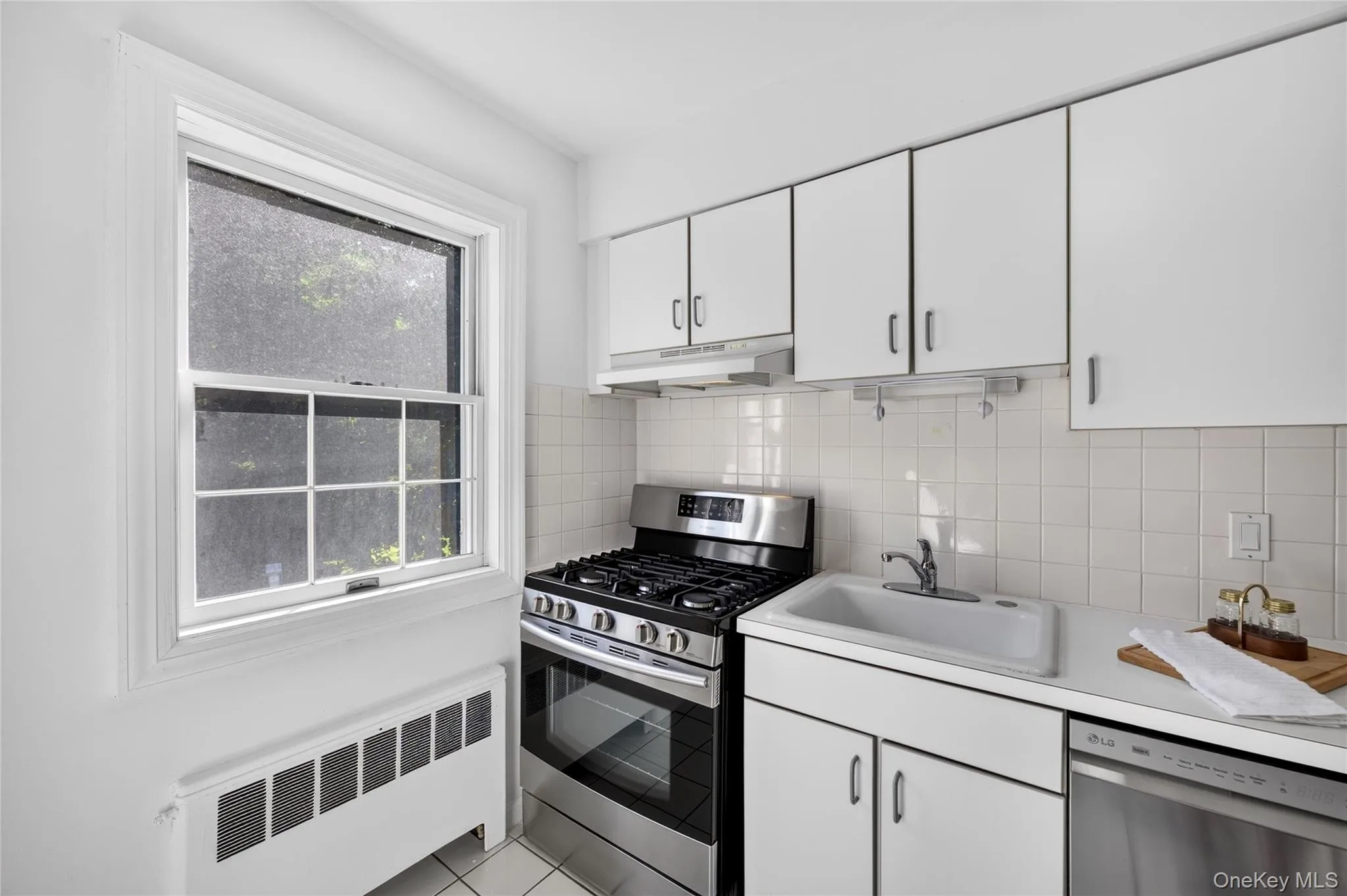 Newly painted kitchen with stainless steel appliances Newly painted kitchen with stainless steel appliances