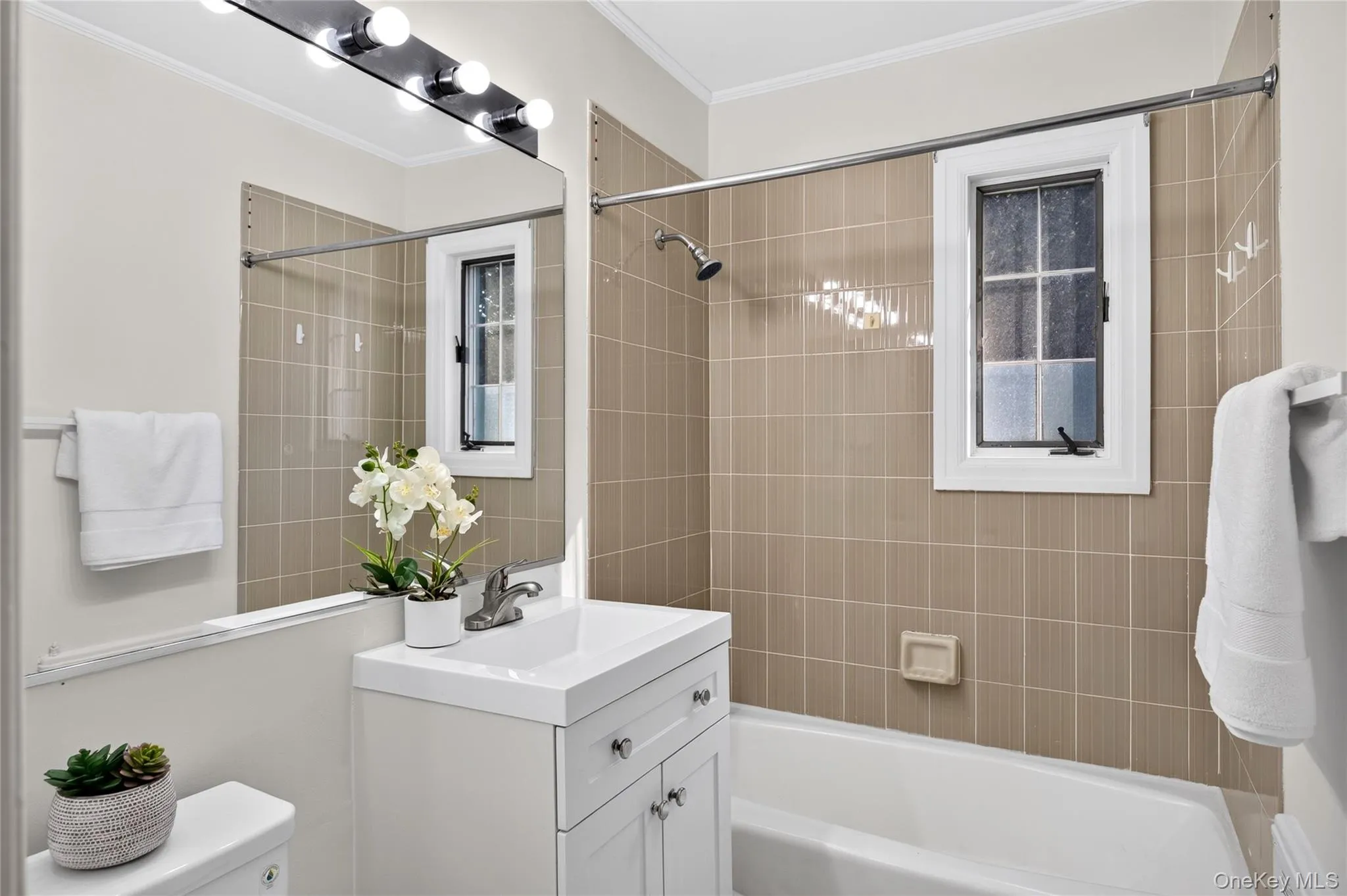 Updated Full Bathroom with New Vanity and Toilet Updated Full Bathroom with New Vanity and Toilet