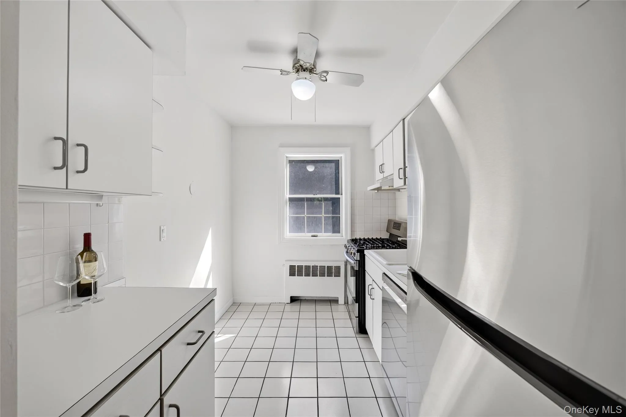 Newly painted kitchen with stainless steel appliances Newly painted kitchen with stainless steel appliances