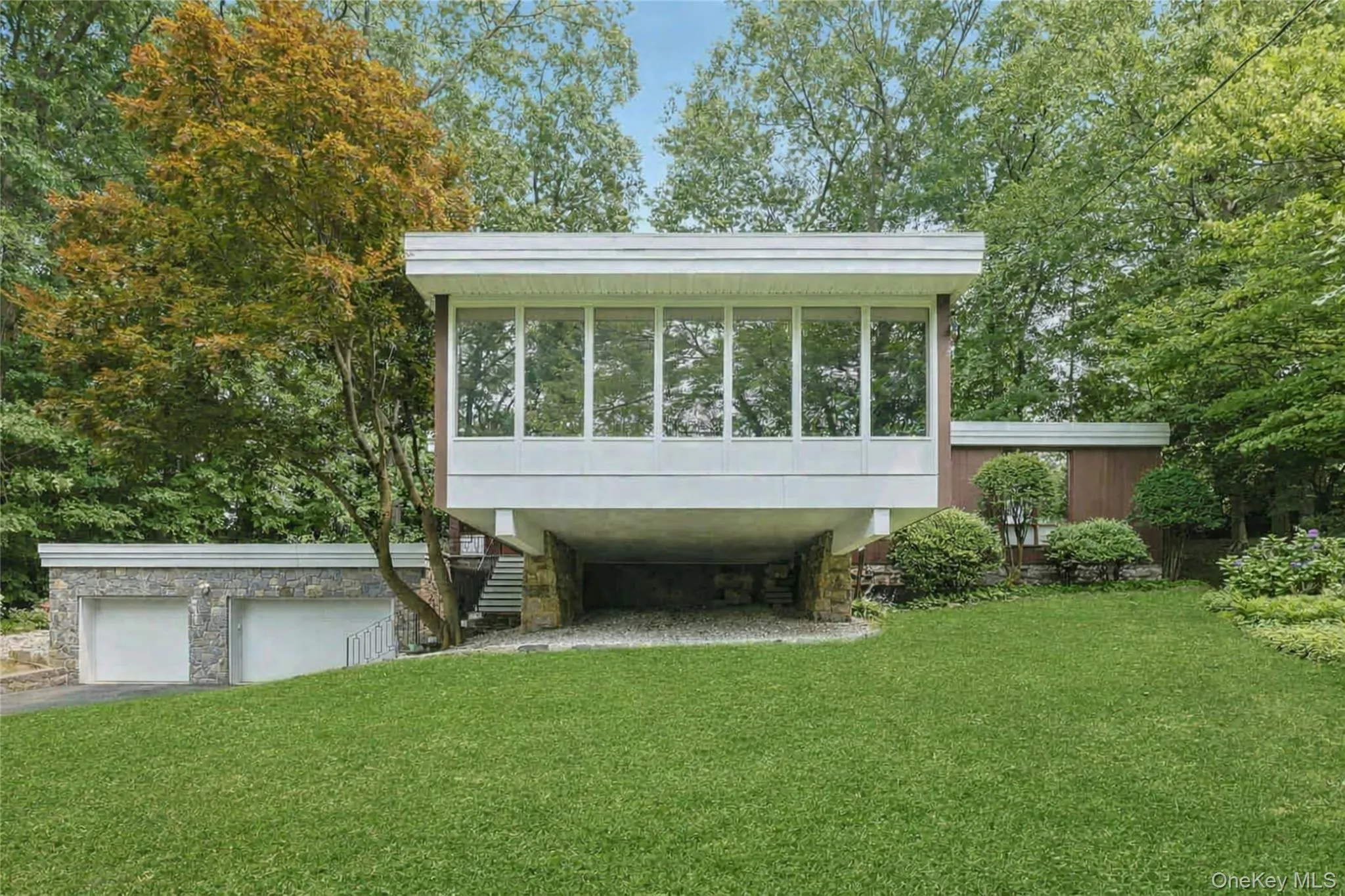 A true Mid-Century Modern gem, this architecturally significant residence combines iconic design, exceptional craftsmanship, and a picture-perfect setting in the award-winning Edgemont School District. A true Mid-Century Modern gem, this architecturally significant residence combines iconic design, exceptional craftsmanship, and a picture-perfect setting in the award-winning Edgemont School District.