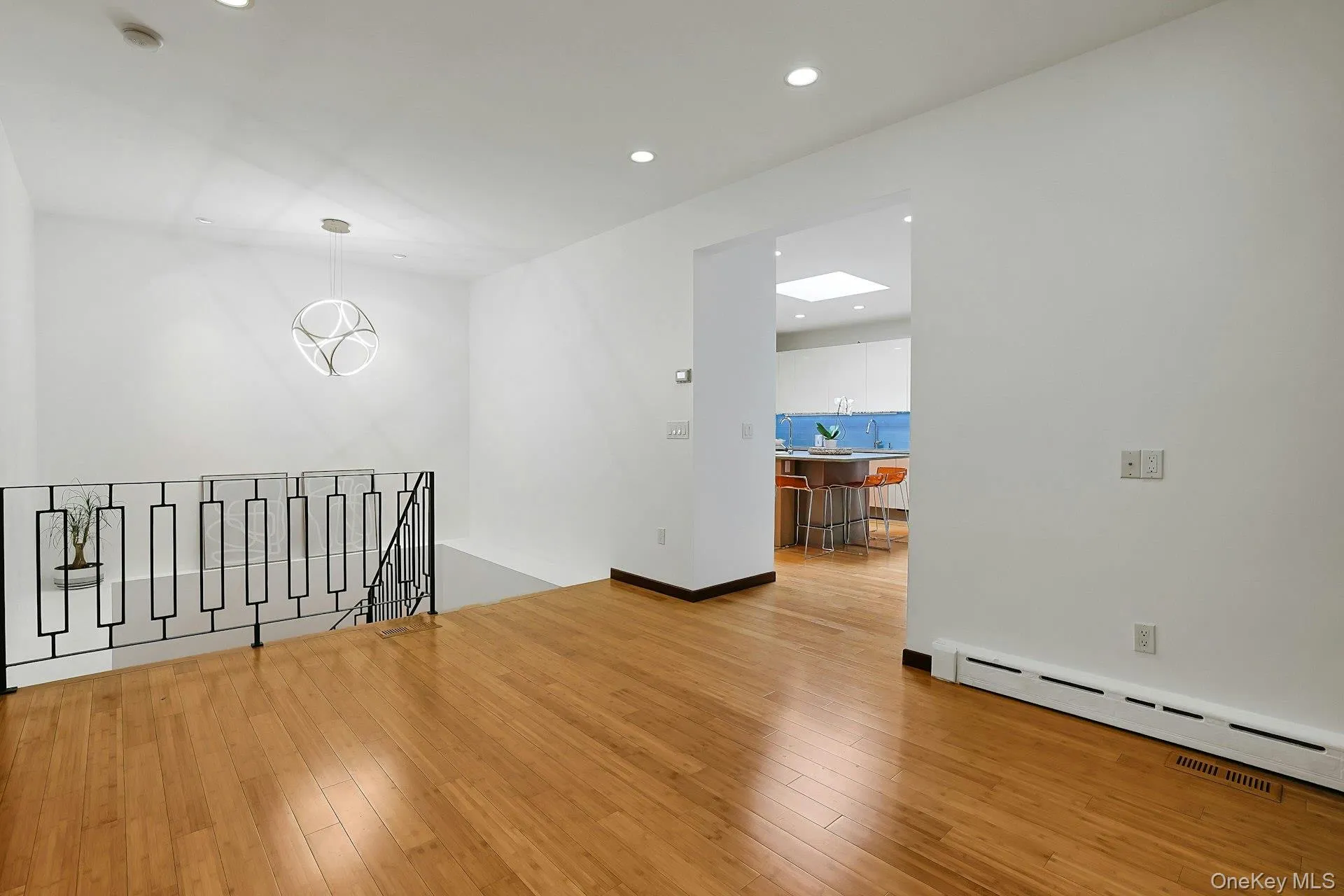 The inviting dining area seamlessly connects to the kitchen through a wide opening. The inviting dining area seamlessly connects to the kitchen through a wide opening.