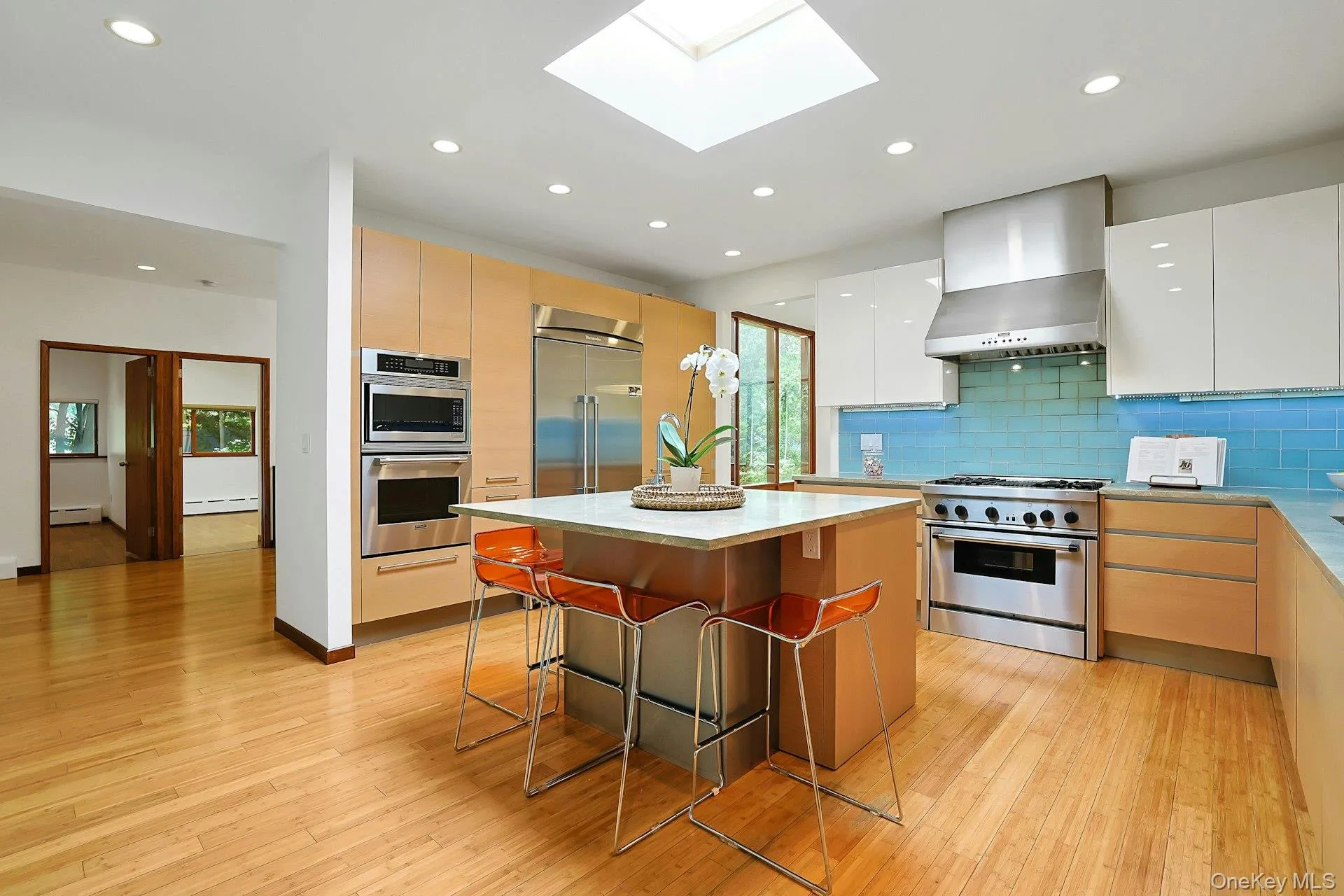 The thoughtfully designed kitchen offers two sinks with disposals, abundant workspace, and a large island that naturally becomes the heart of the home. The thoughtfully designed kitchen offers two sinks with disposals, abundant workspace, and a large island that naturally becomes the heart of the home.