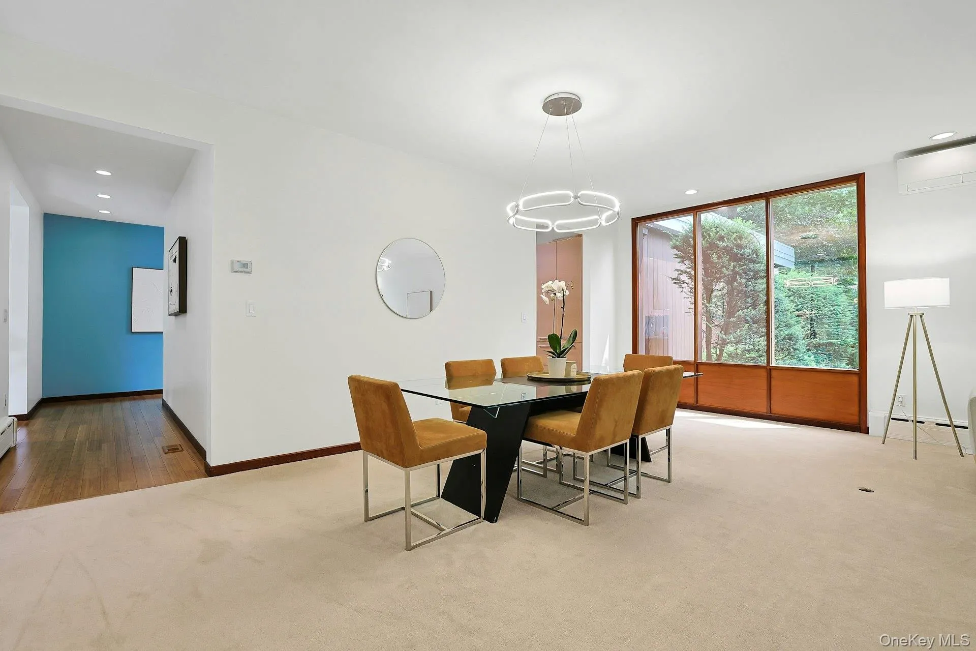 The generous dining area enjoys picturesque views, effortless access to the kitchen, and plenty of room for memorable dinners with family and friends. The generous dining area enjoys picturesque views, effortless access to the kitchen, and plenty of room for memorable dinners with family and friends.
