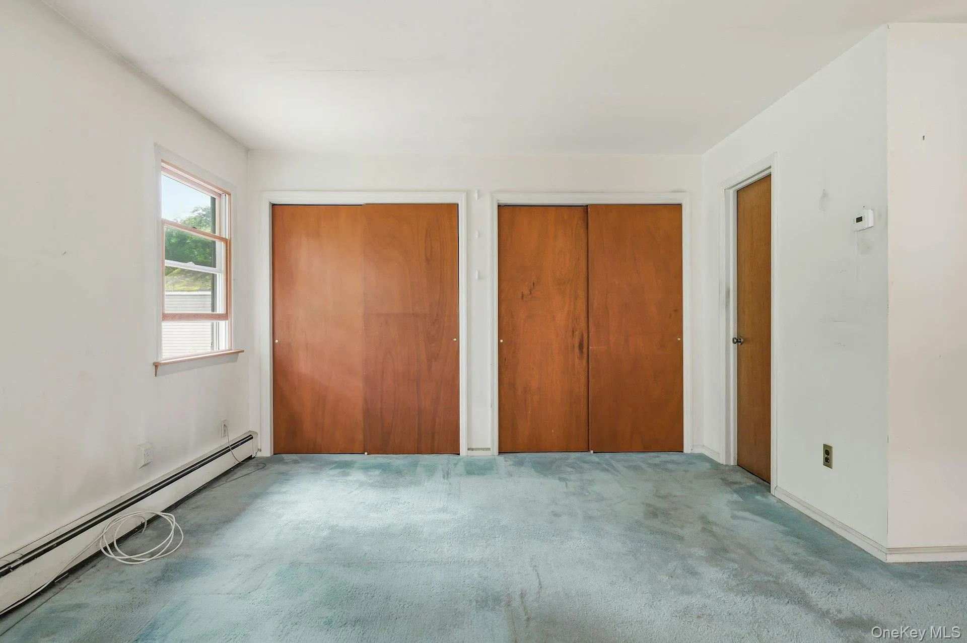 First floor bedroom with double closets. First floor bedroom with double closets.