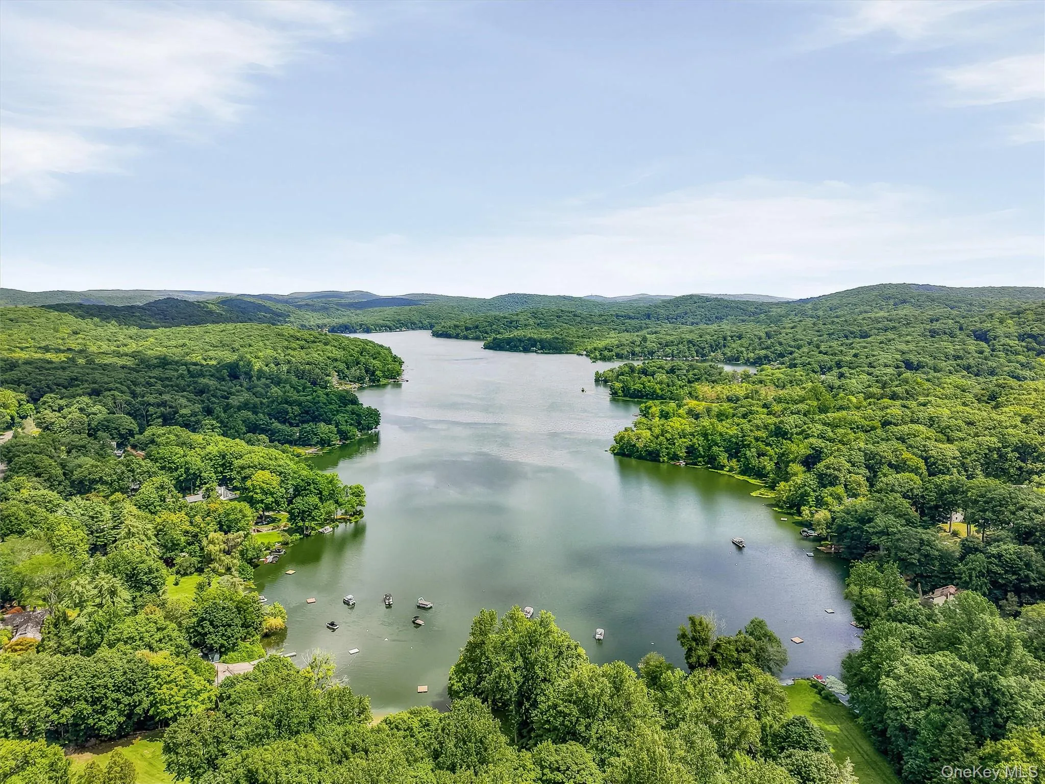Sound End of Oscawana Lake surrounded by dense, mature woodlands Sound End of Oscawana Lake surrounded by dense, mature woodlands