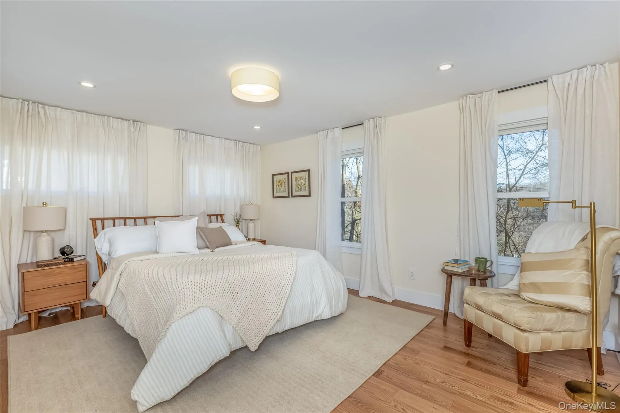 Bedroom featuring light wood-type flooring Bedroom featuring light wood-type flooring